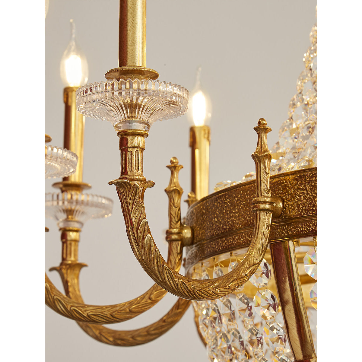 The chandelier unlit, highlighting the clarity of the crystal.