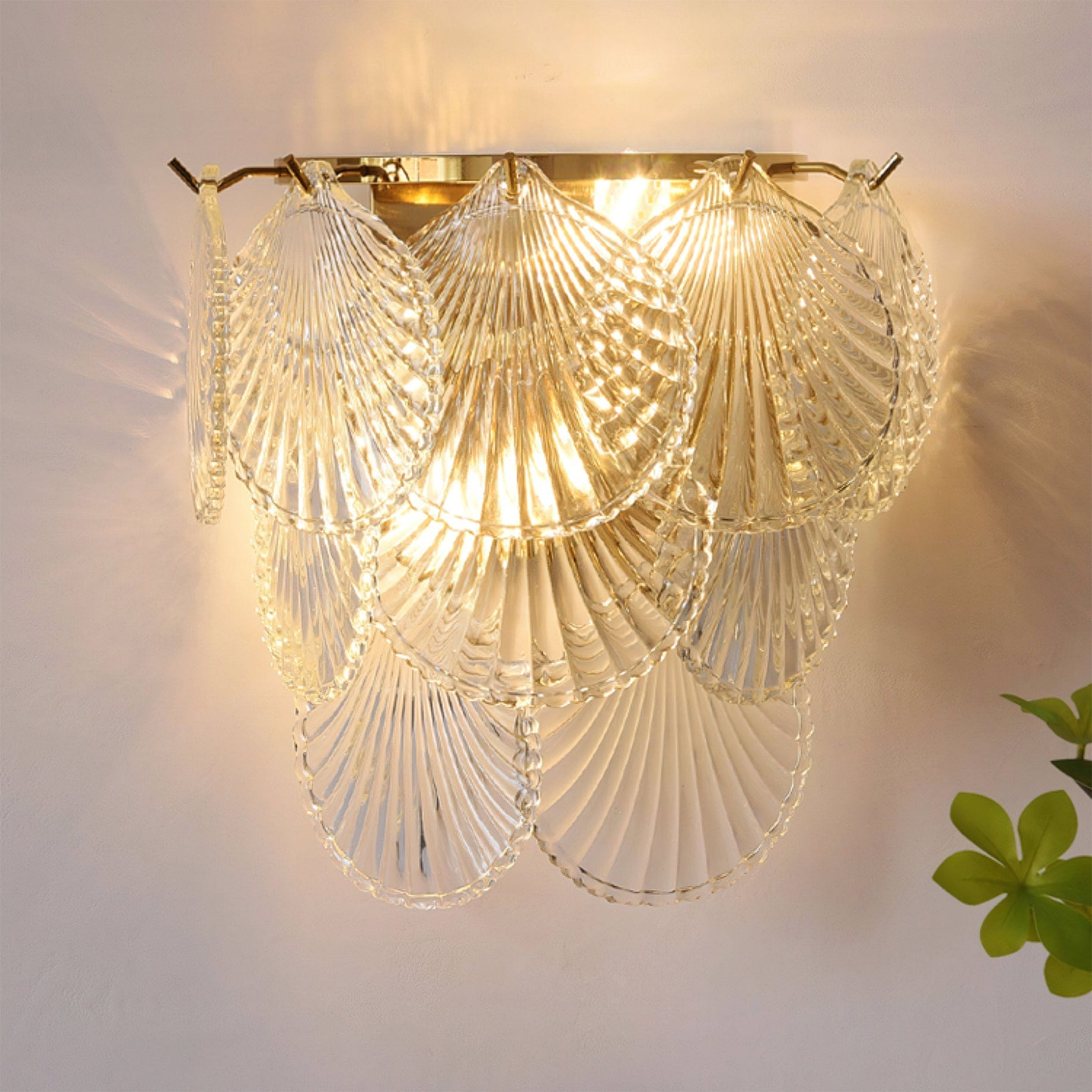 Close-up of the Galerie Wall Lamp's intricate glass and metal details.