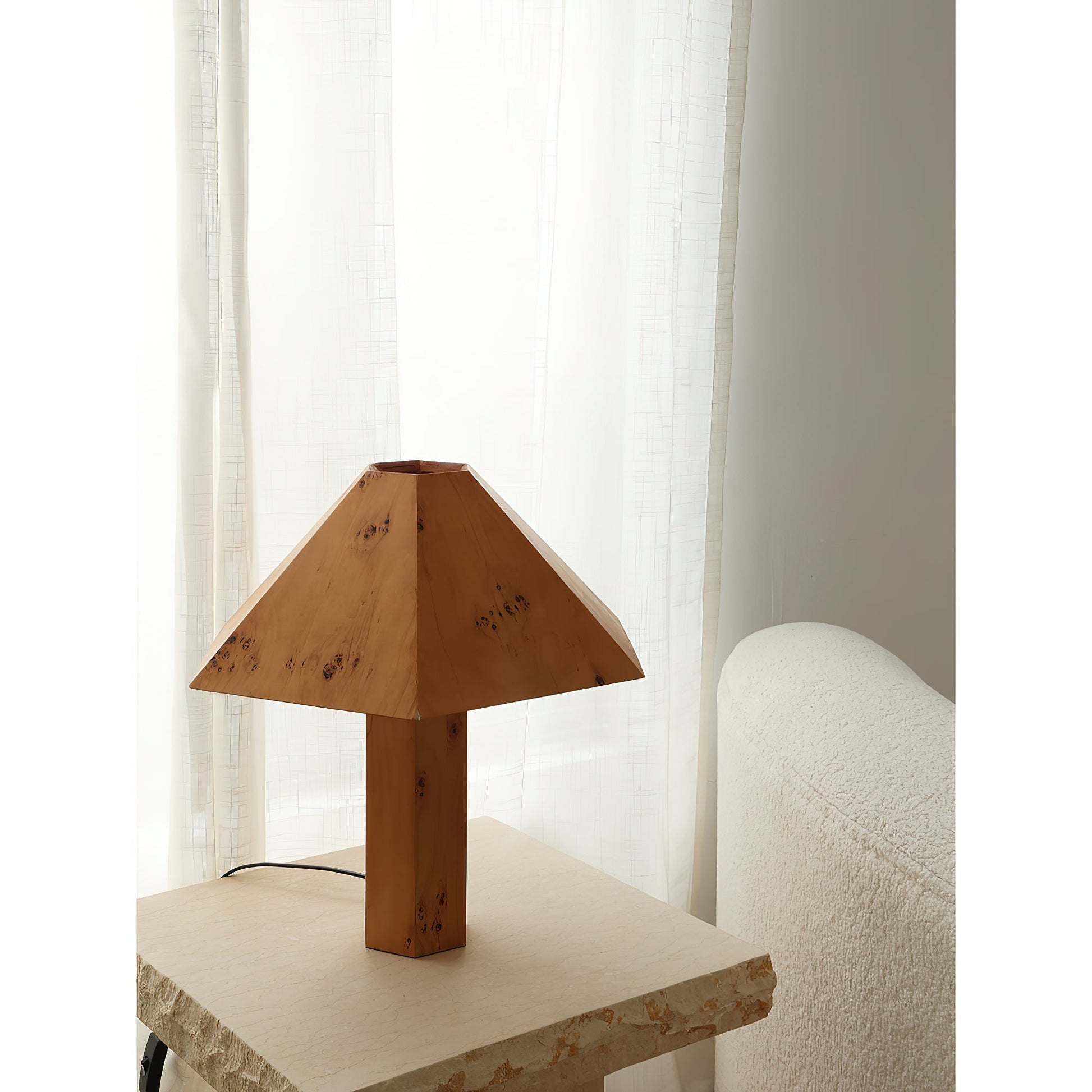 Gena Table Lamp from a distance in a well-lit room.