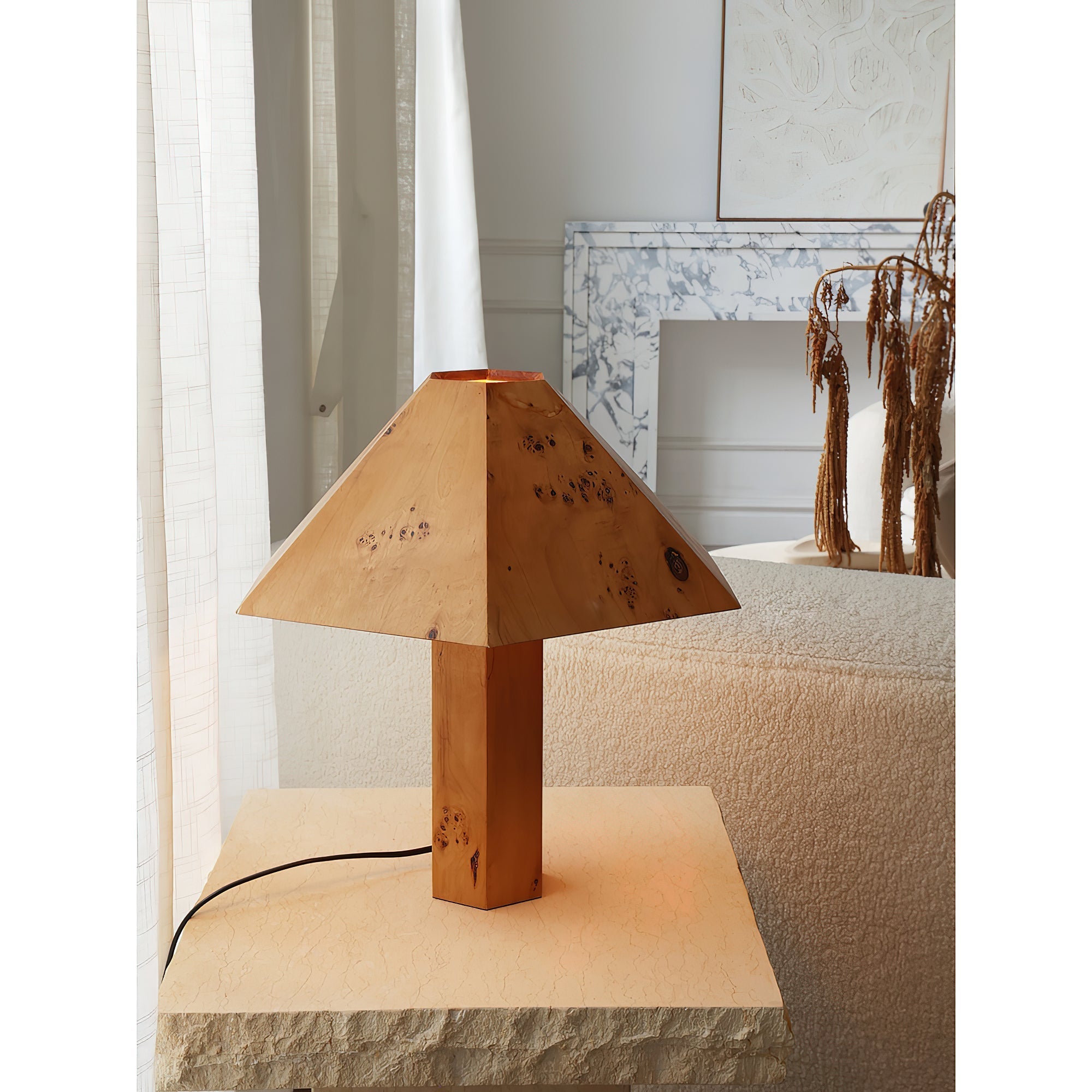 Gena Table Lamp on a wooden surface.