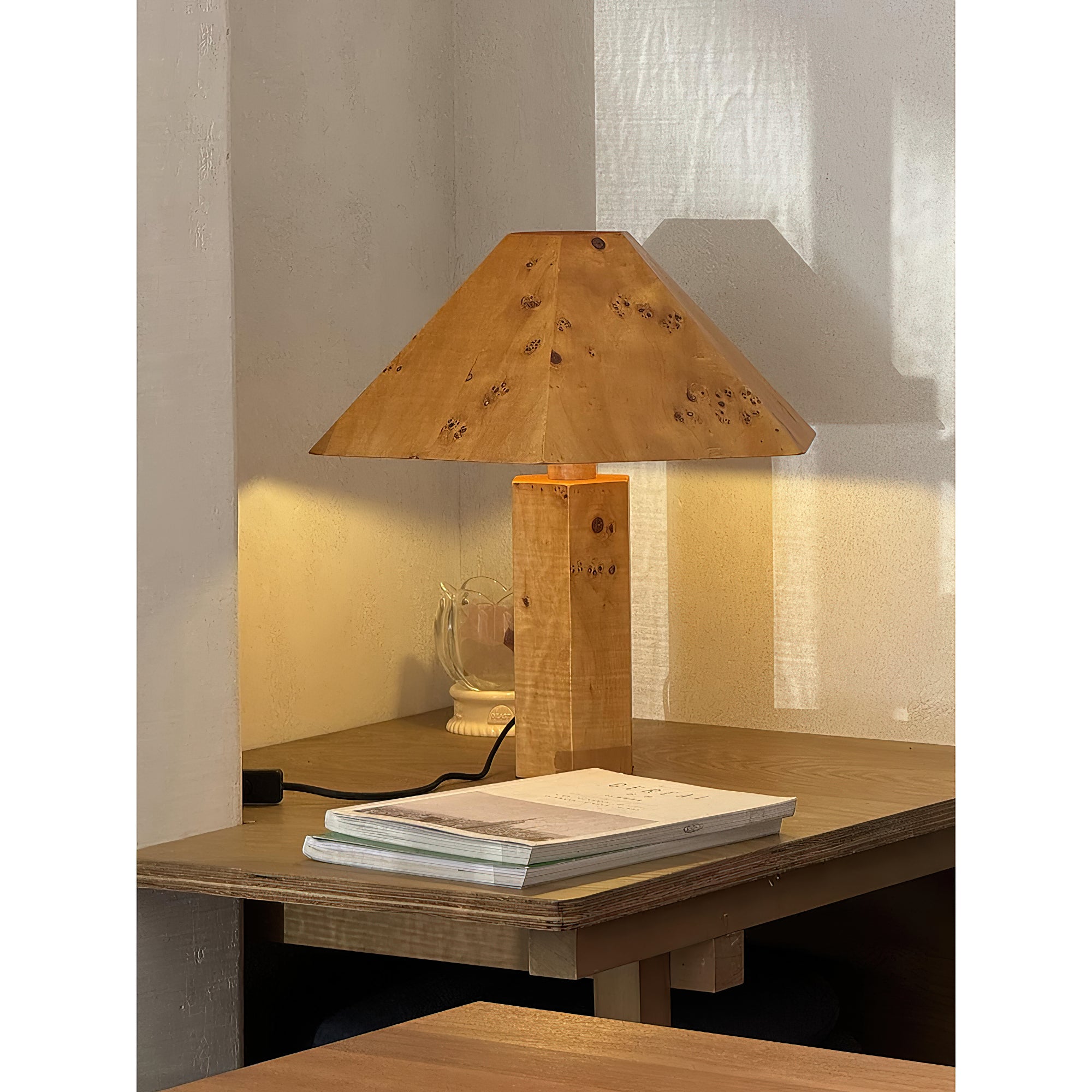 The lamp providing ambient lighting in the evening.
