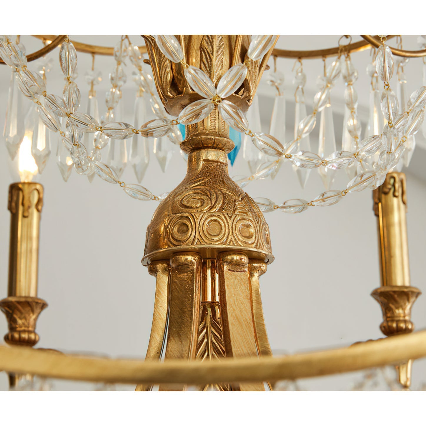 Another angle of the chandelier, showing light refraction through the crystals.