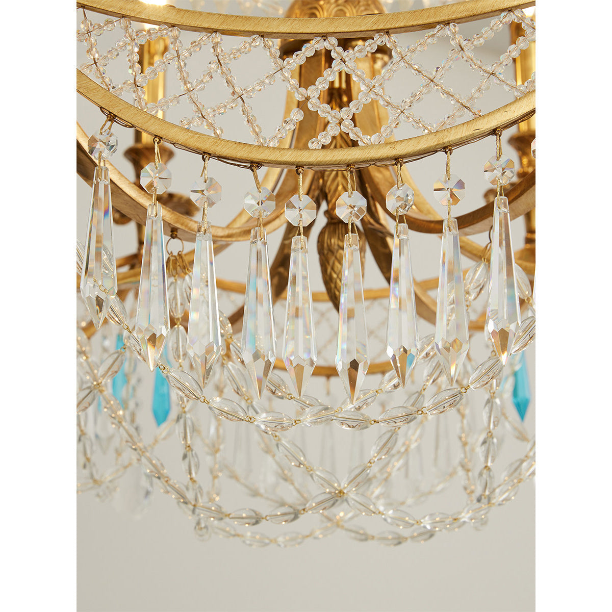 The chandelier unlit, displaying its sculptural quality.