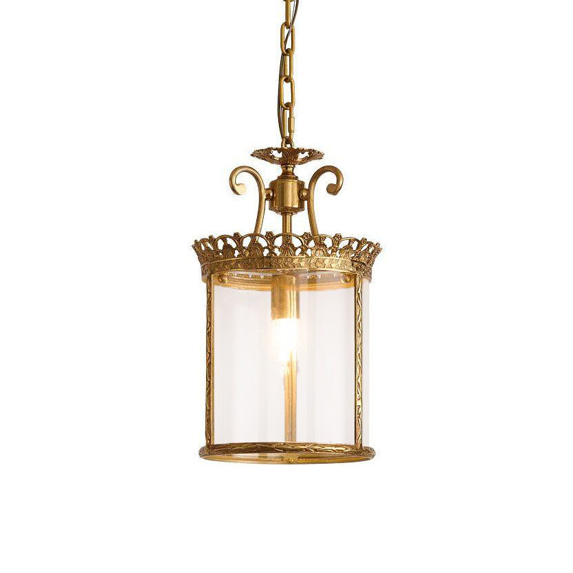 Gentry Pendant Lamp with a brass body and clear glass shade.