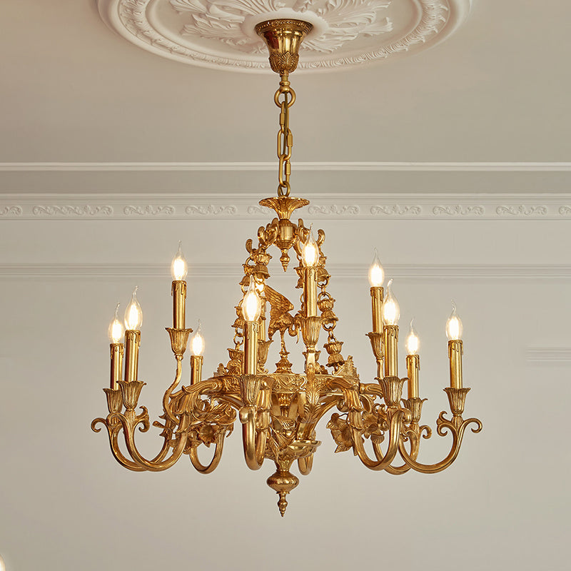 Close-up of the intricate scrollwork on the chandelier arms.