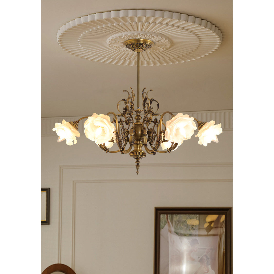 Angled view of the chandelier, highlighting its gracefully arching arms.