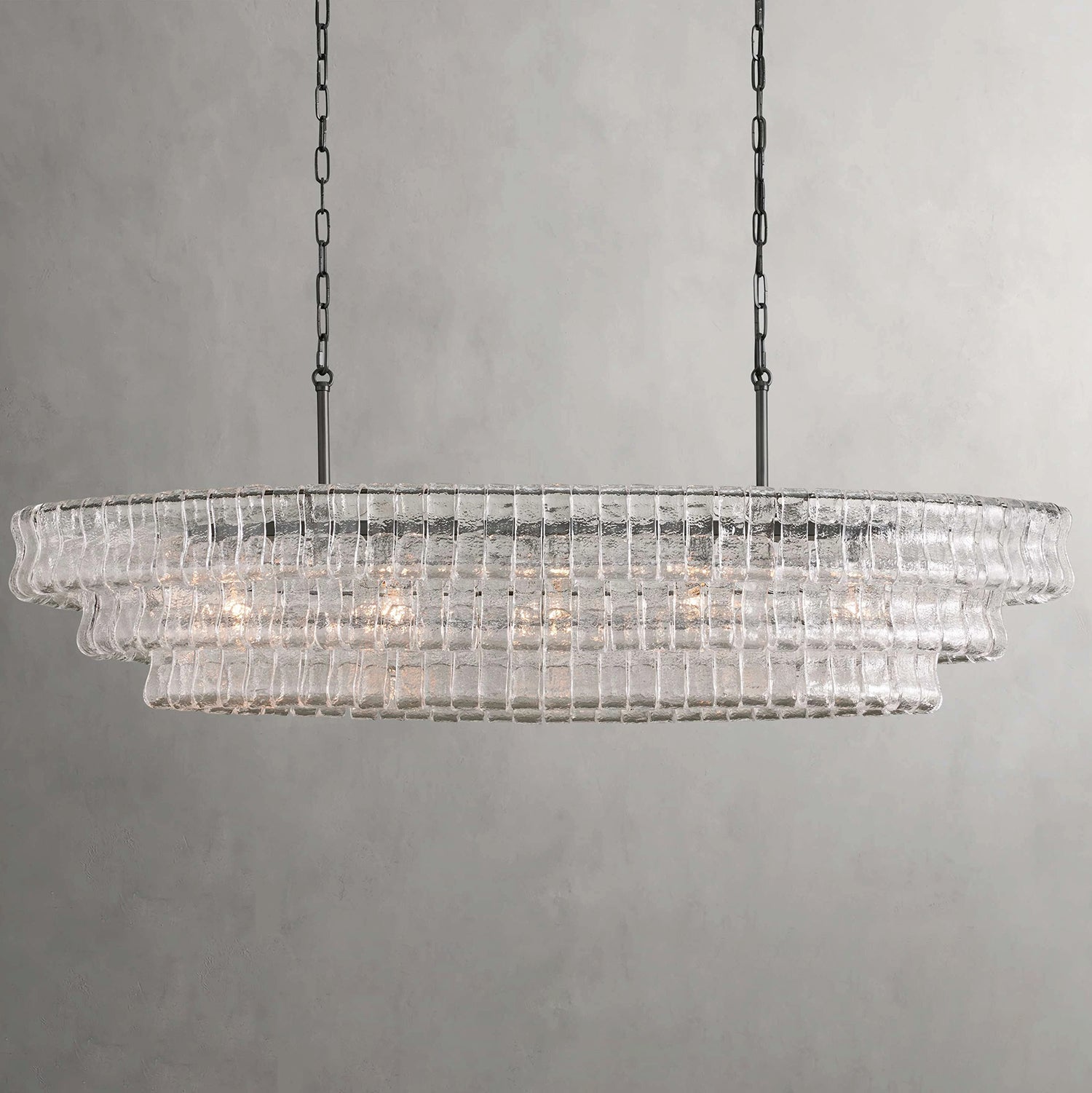 The black glass Albano Chandelier, creating a bold statement.