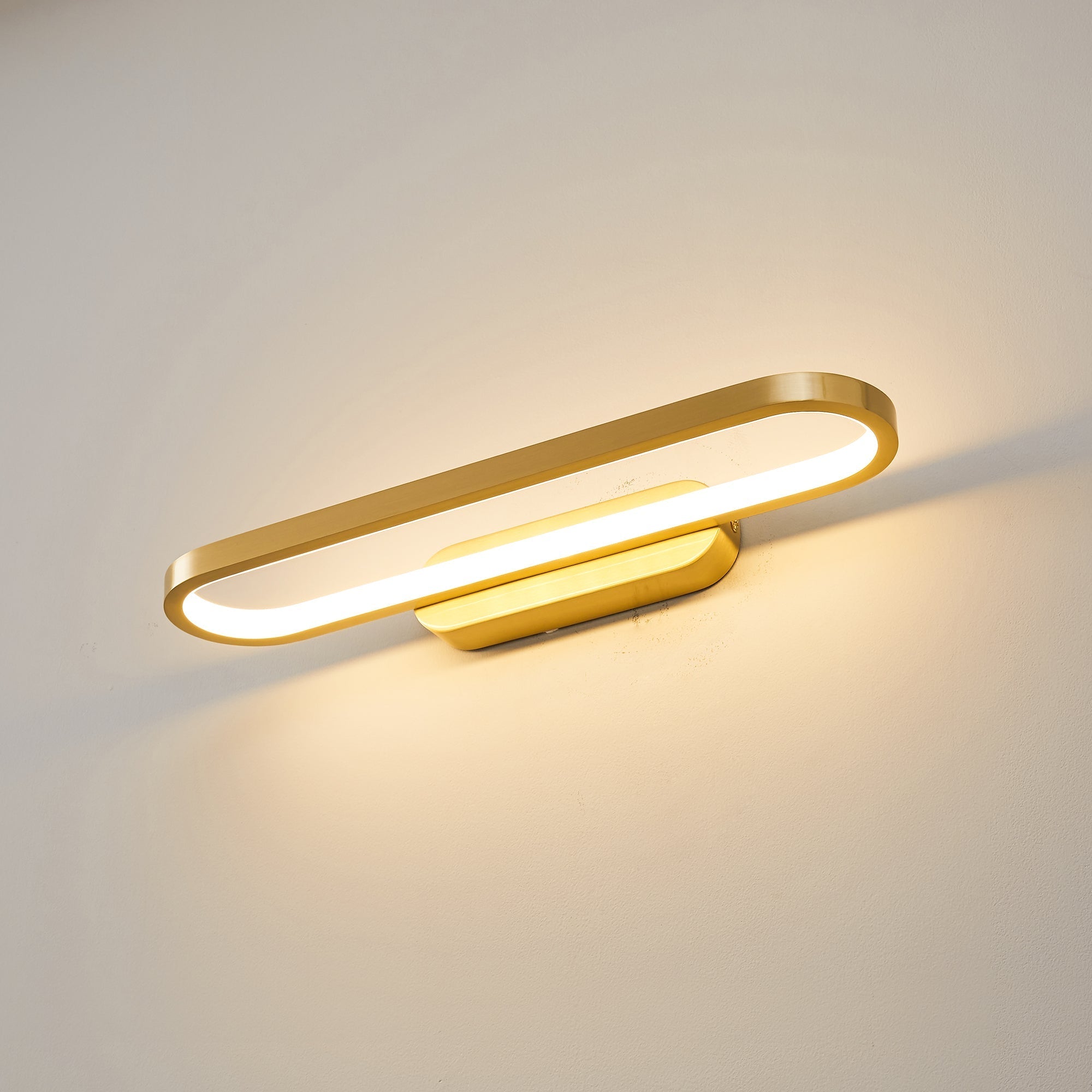 Gianni LED Wall Lamp shown in a minimalist hallway setting.