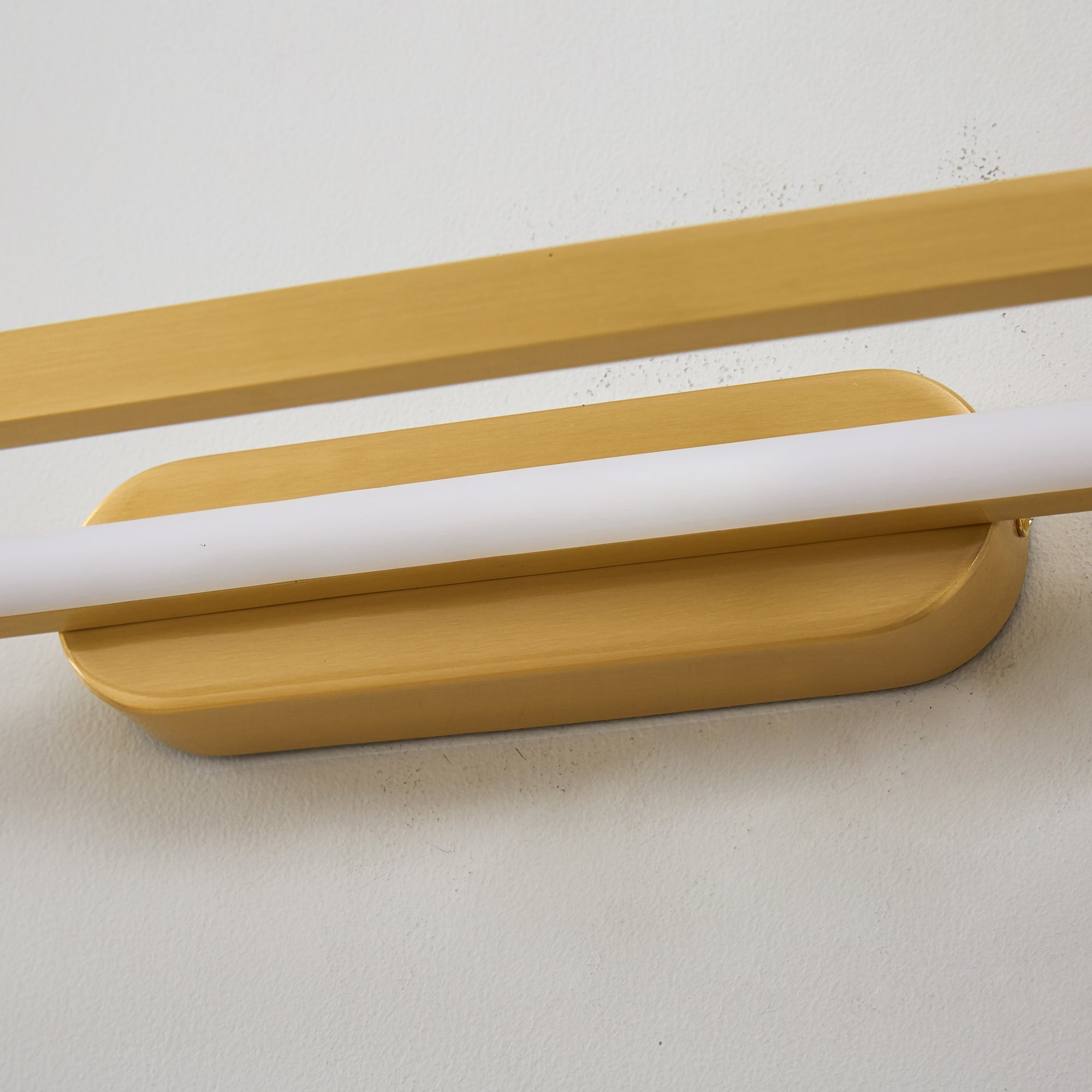 Comparison of the brass and white finishes side-by-side.
