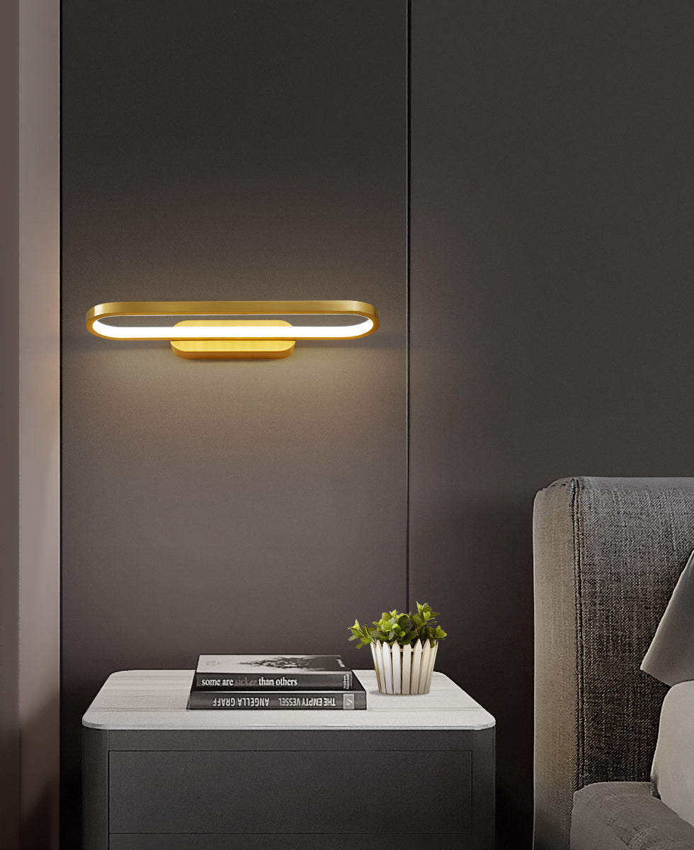 Angled view of the Gianni LED Wall Lamp in brass.