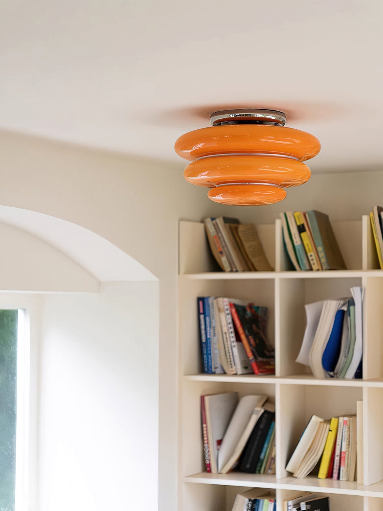 Detail shot of the chrome and glass accents on the Gispen ceiling fixture.