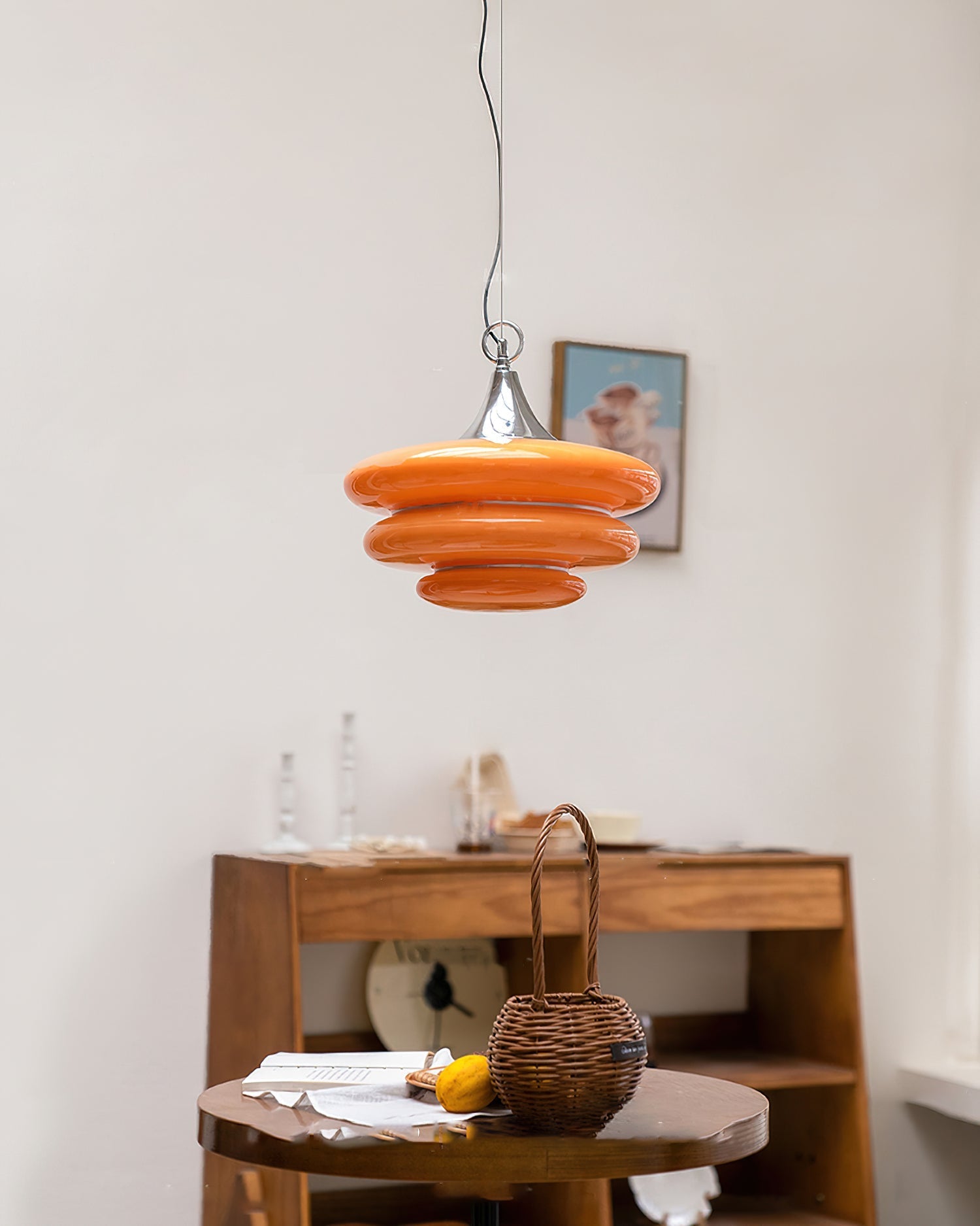 Gispen Orange Pendant Light in a living room setting.