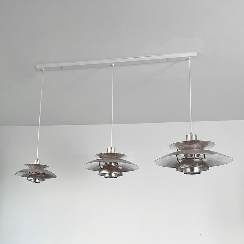 Three-head gold foil lamp from a distance.
