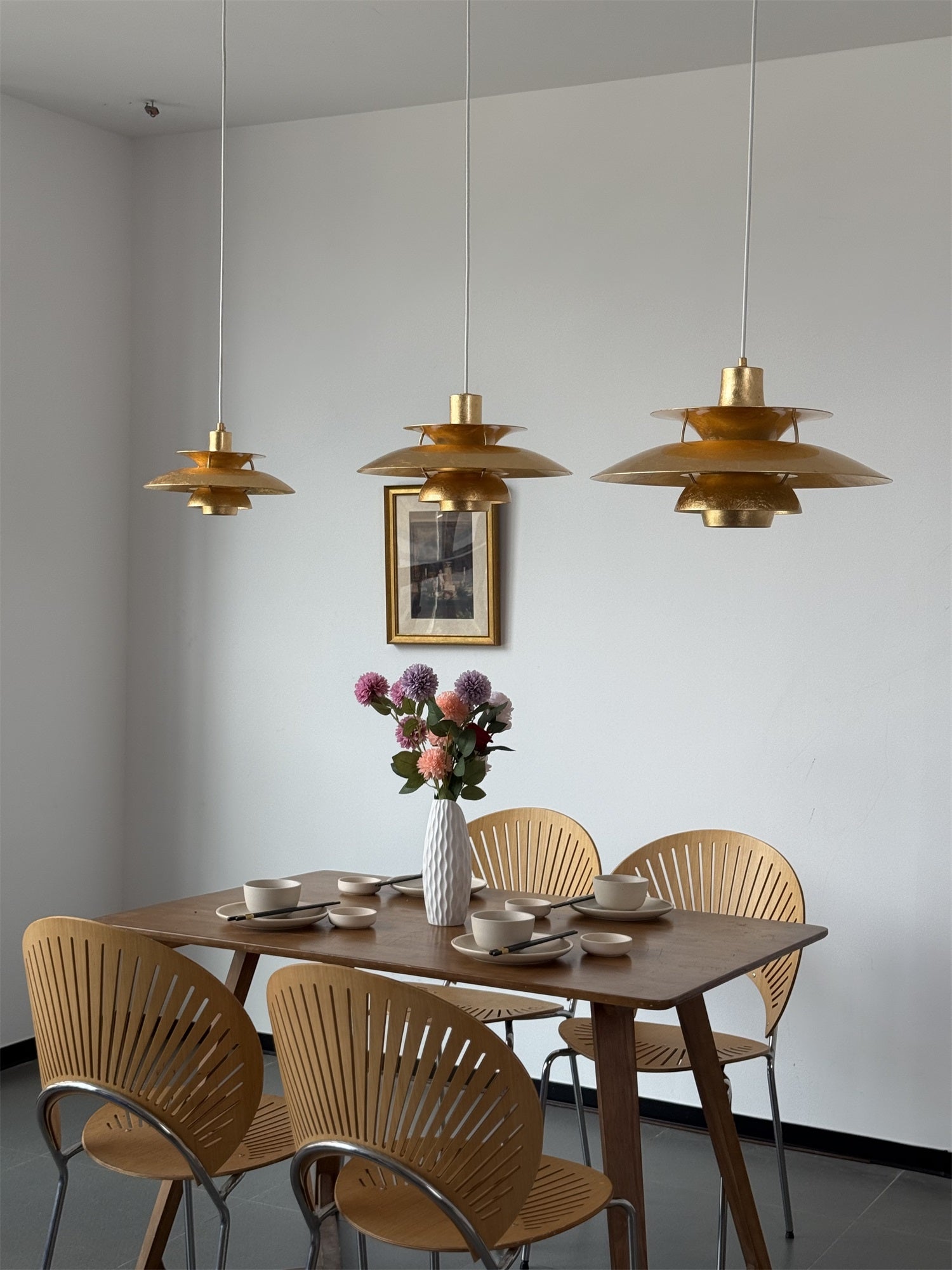 Close-up of the layered aluminum shade of the Gold Foil PH Pendant Lamp.