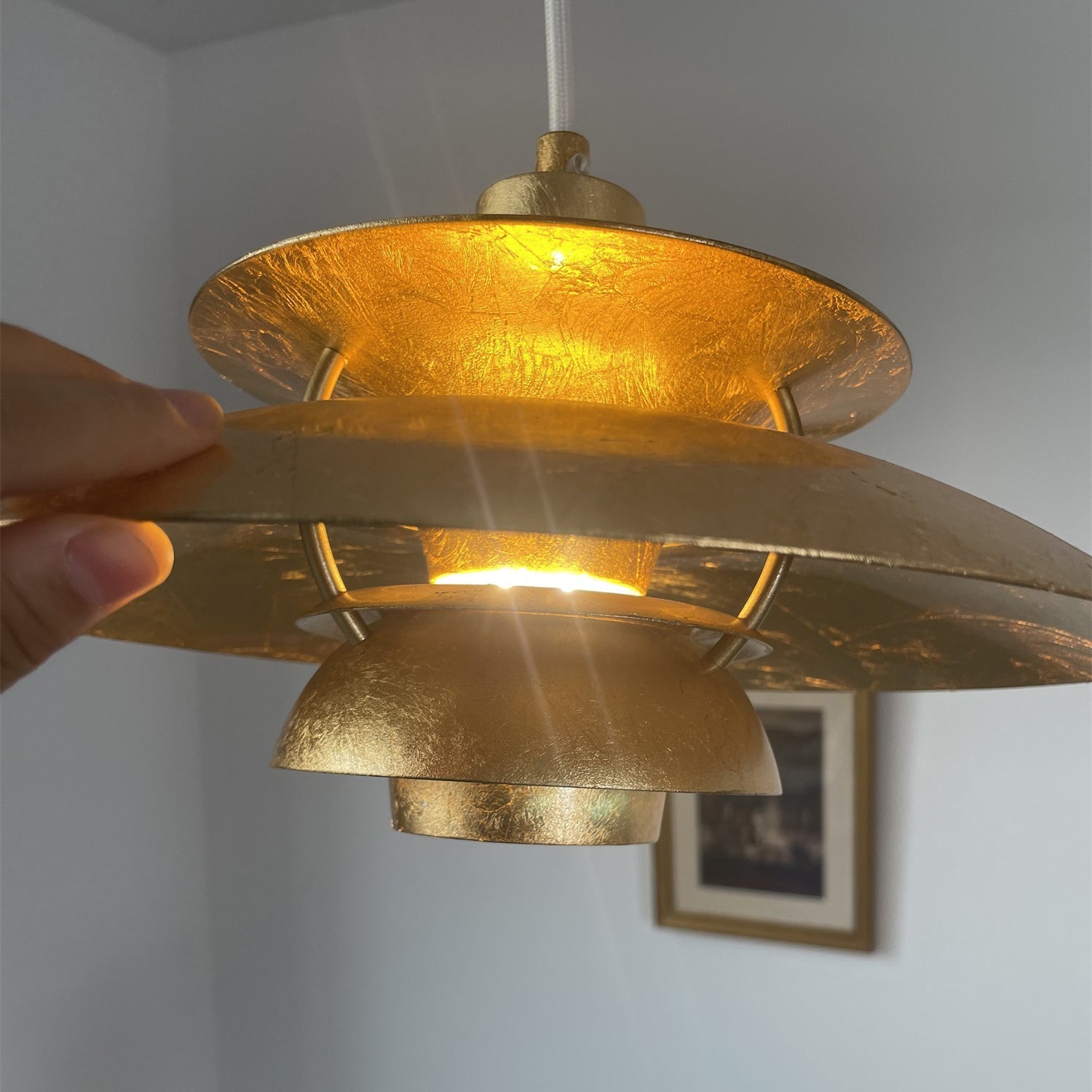 The lamp switched off, showcasing its sculptural form.