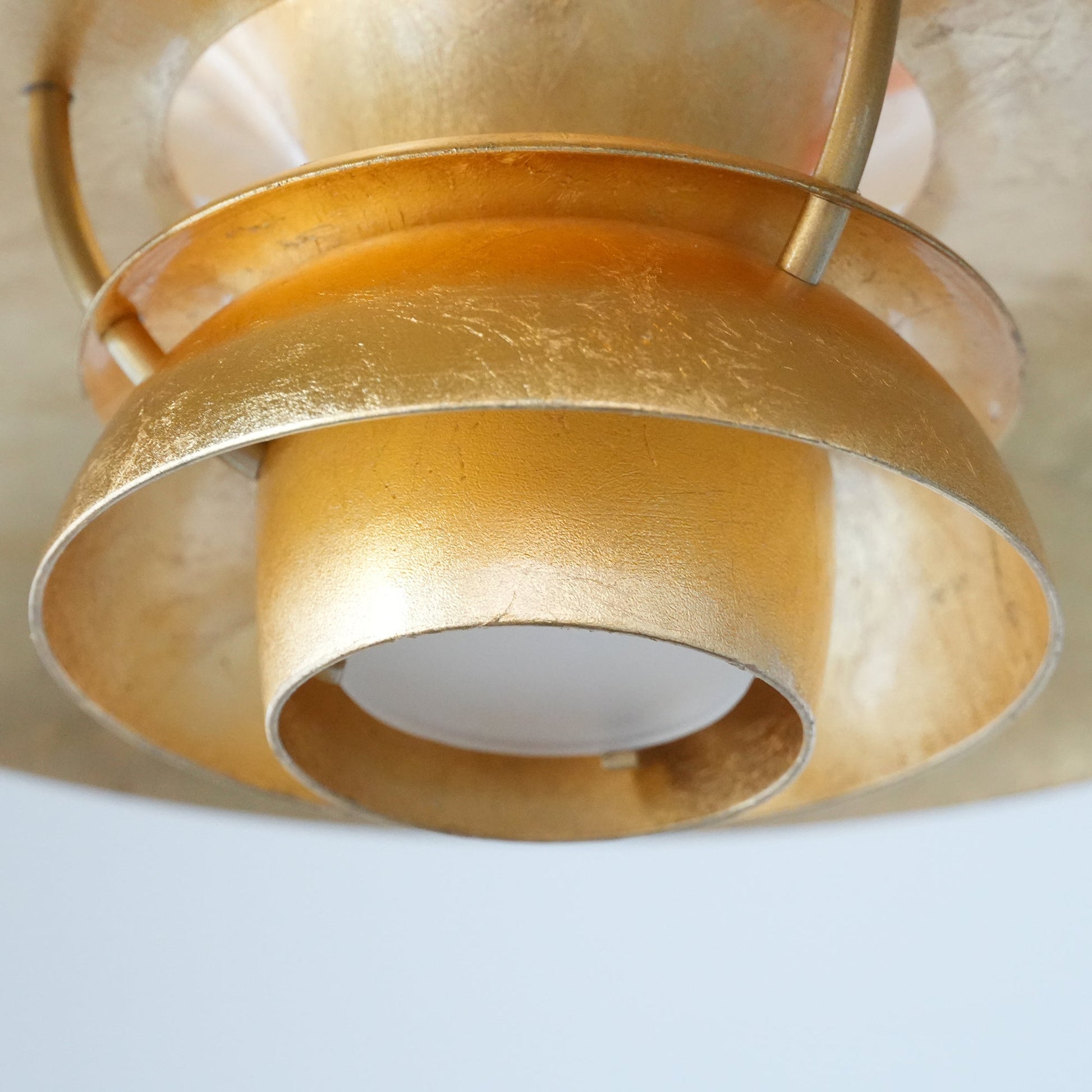 The lamp casting a warm, downward glow.