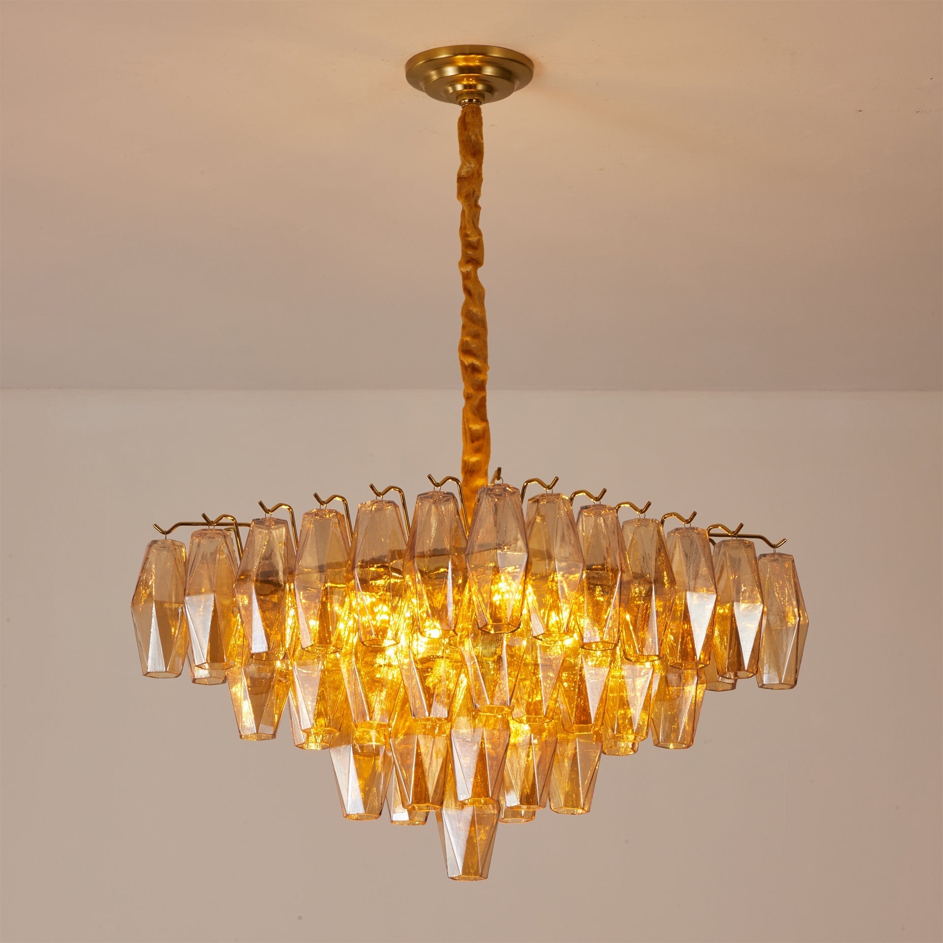 The chandelier in a formal dining room setting.