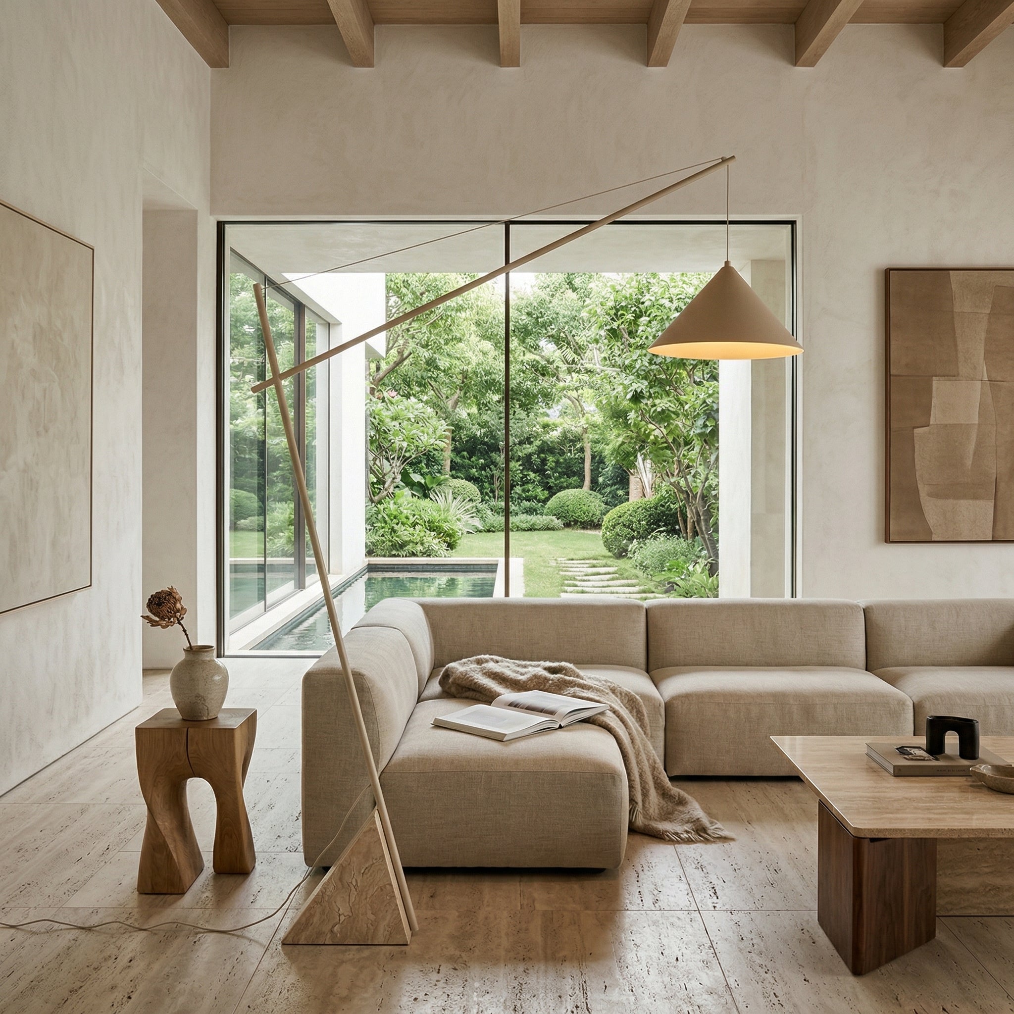 Close-up of the Grande Travertine Floor Lamp's textured stone base.