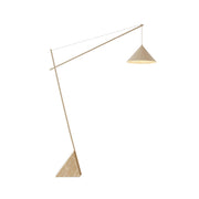 Grande Travertine Floor Lamp with a beige metal shade and natural stone base.