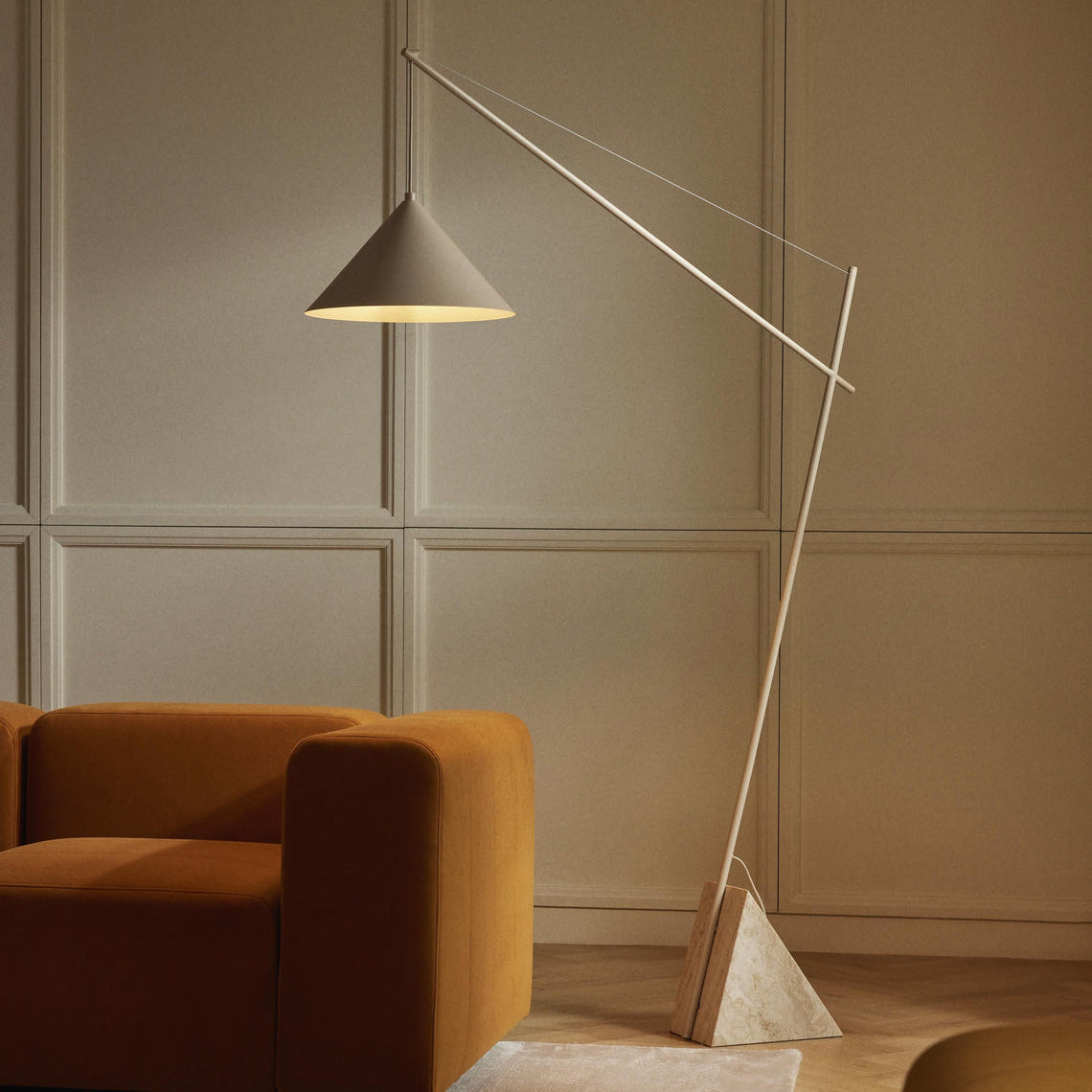 Side profile of the arc-style Grande Travertine Floor Lamp.