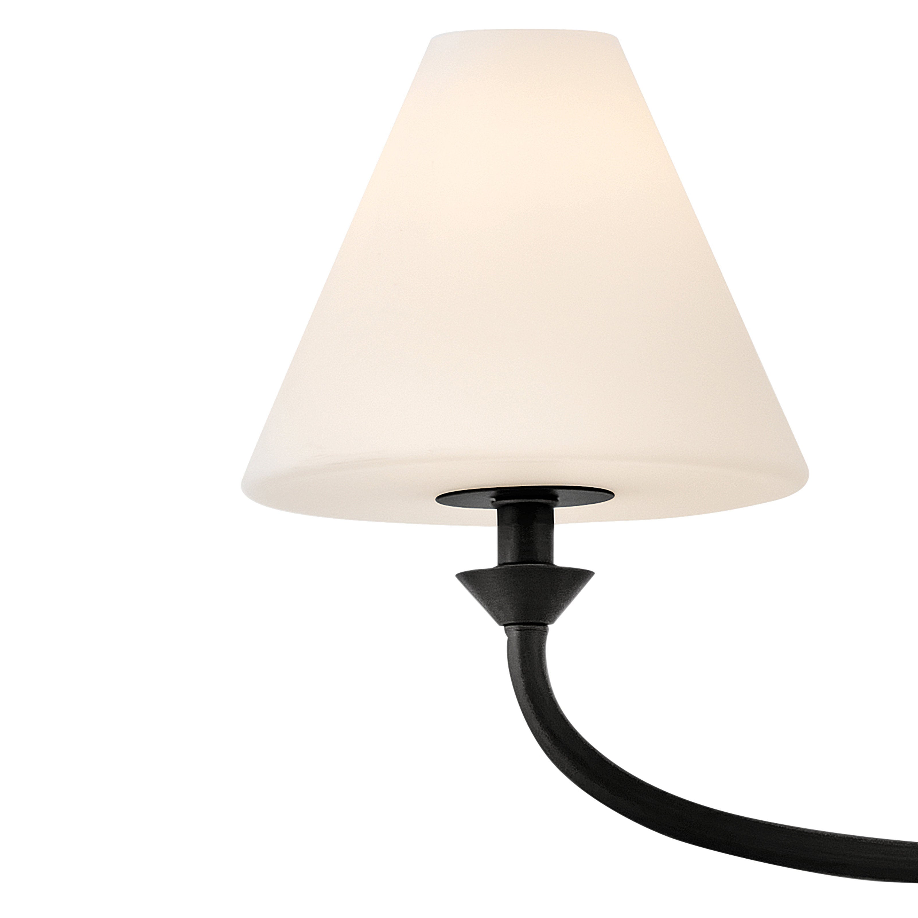The Greta Wall Lamp turned on, casting a soft, diffused light.