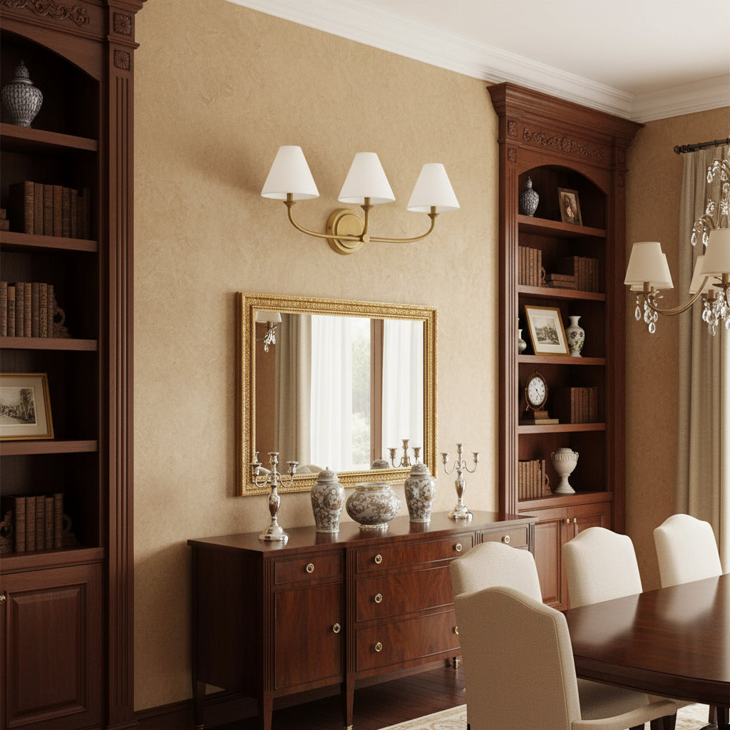 Close-up of the Greta Wall Lamp's brass finish and white glass shade.