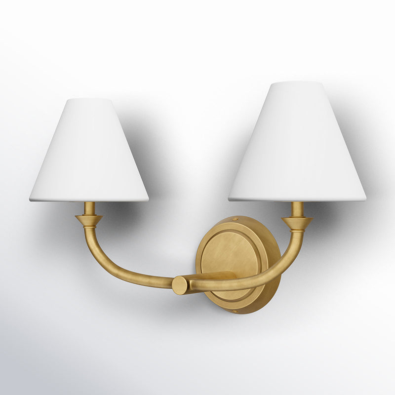 Greta Wall Lamp installed above a bedroom nightstand.
