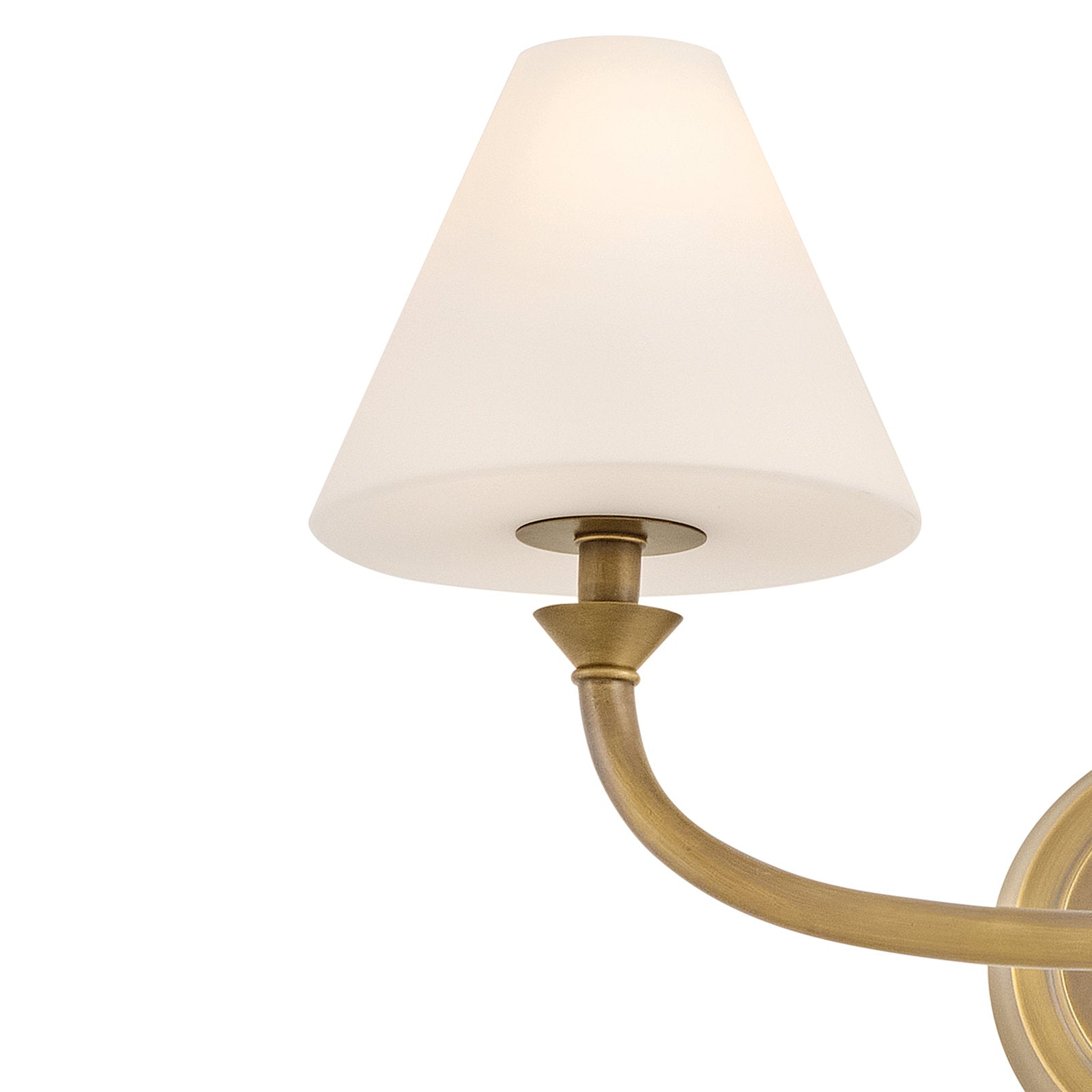 Close-up of the brass lamp body and mounting plate.