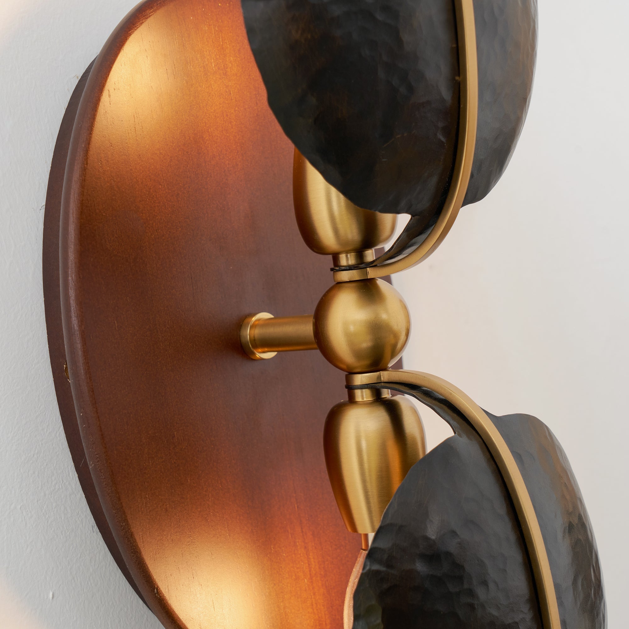 Detail of the craftsmanship on the wooden component of the lamp.