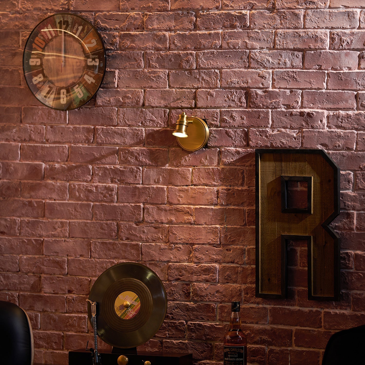 Angled view of the two-head Halophane Brass Wall Lamp.