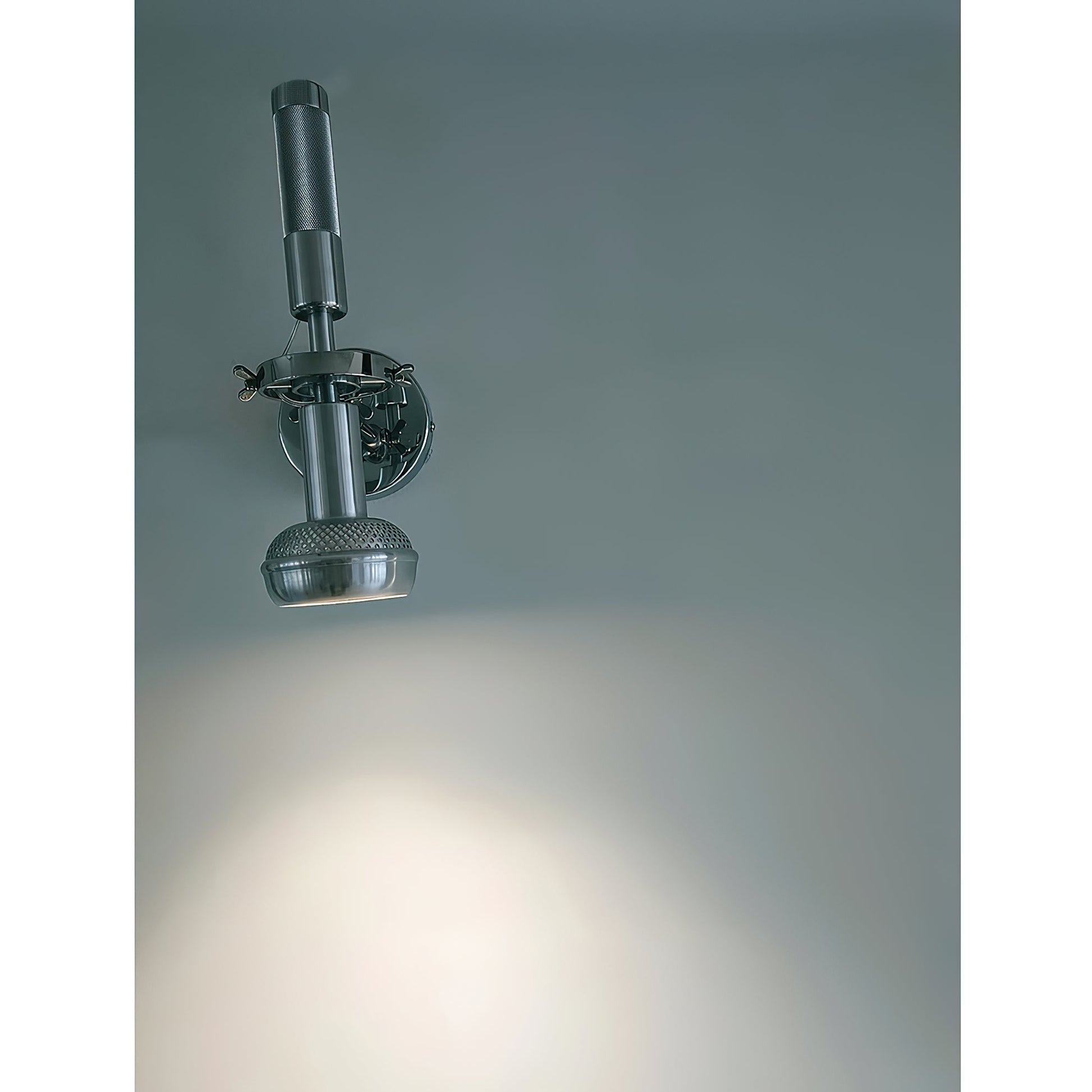 Lifestyle image of the Halva Wall Lamp providing ambient light in a living room.