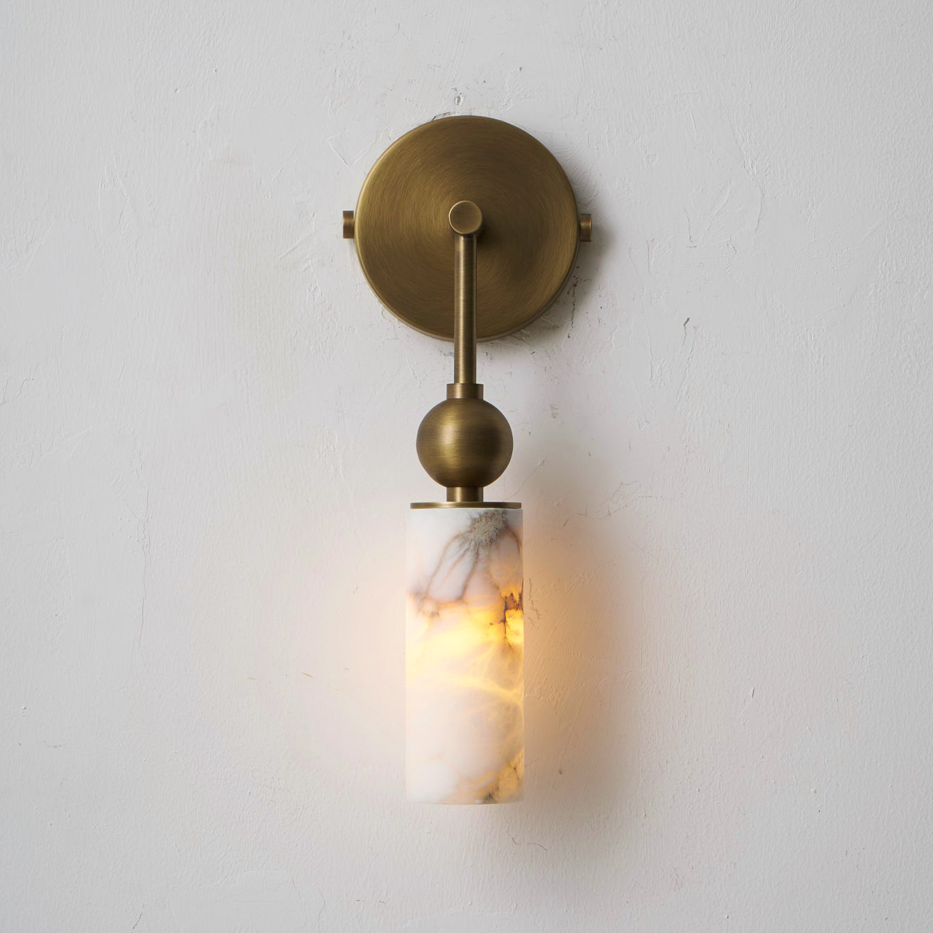 Metro Alabaster Wall Lamp, black finish, in a bedroom setting.