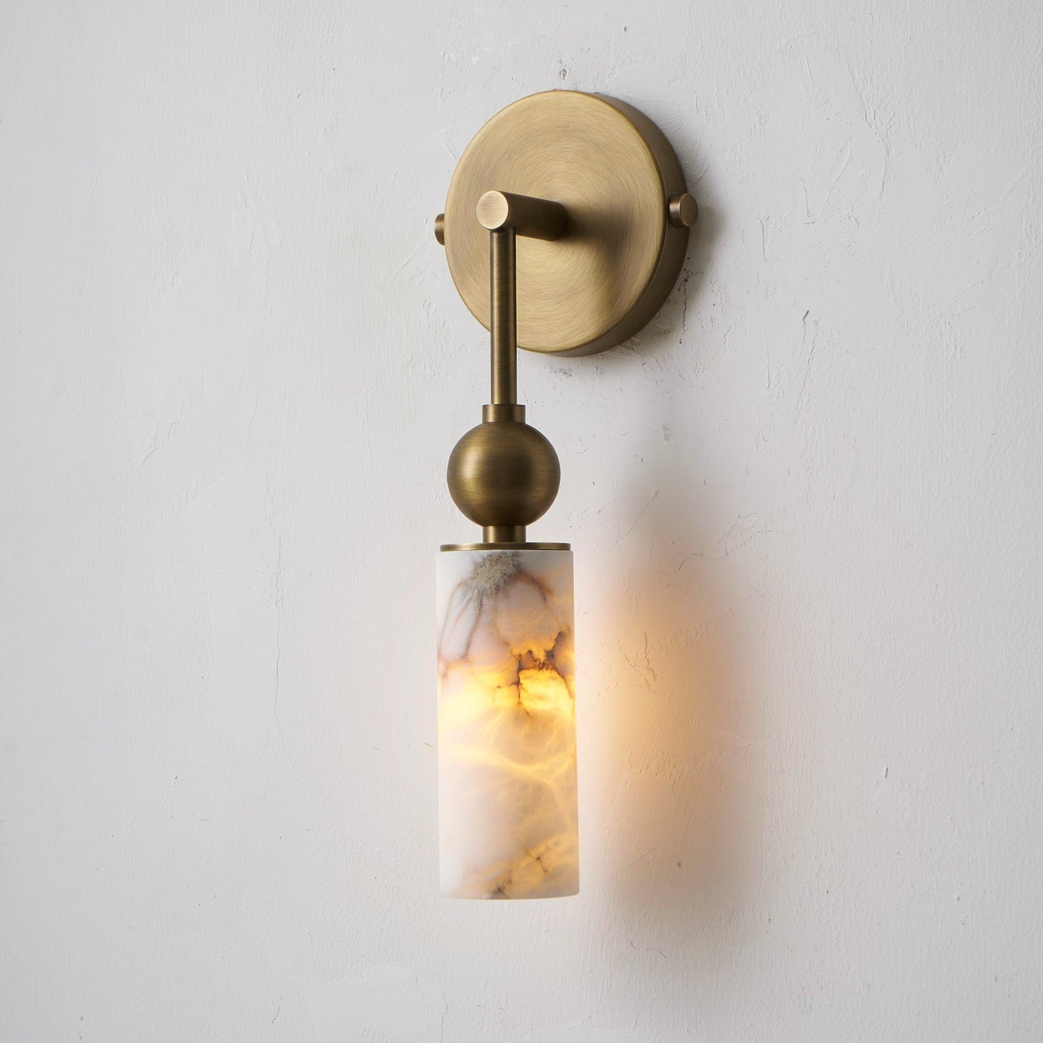 Metro Alabaster Wall Lamp, nickel finish, in a minimalist bathroom.