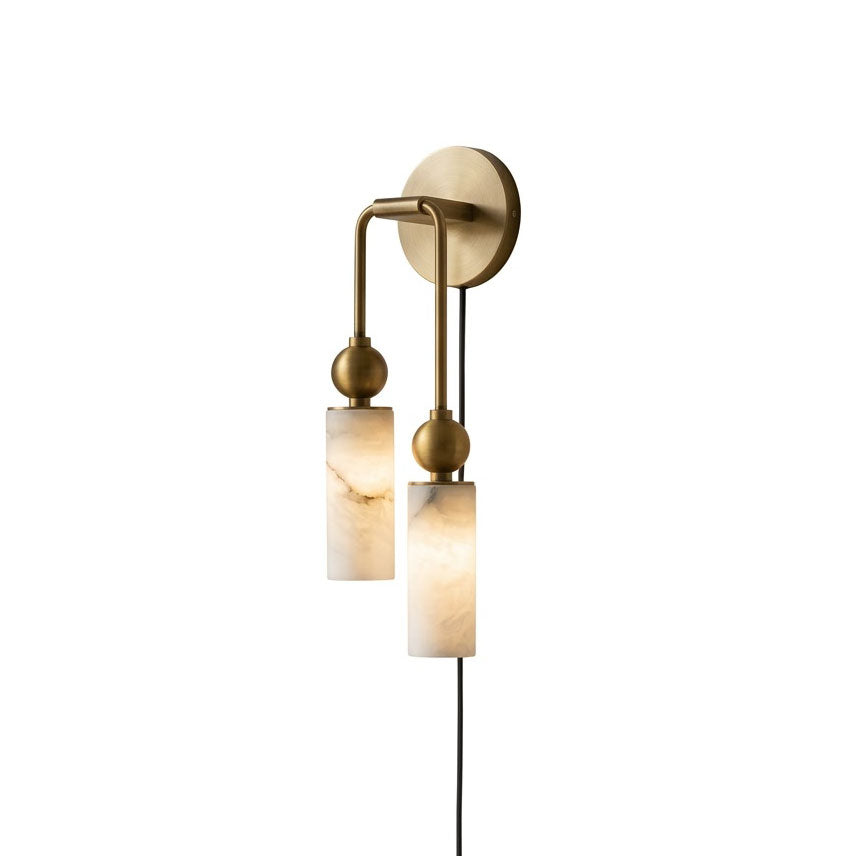 Harlin Alabaster Plug-in Wall Sconce in a brass finish.