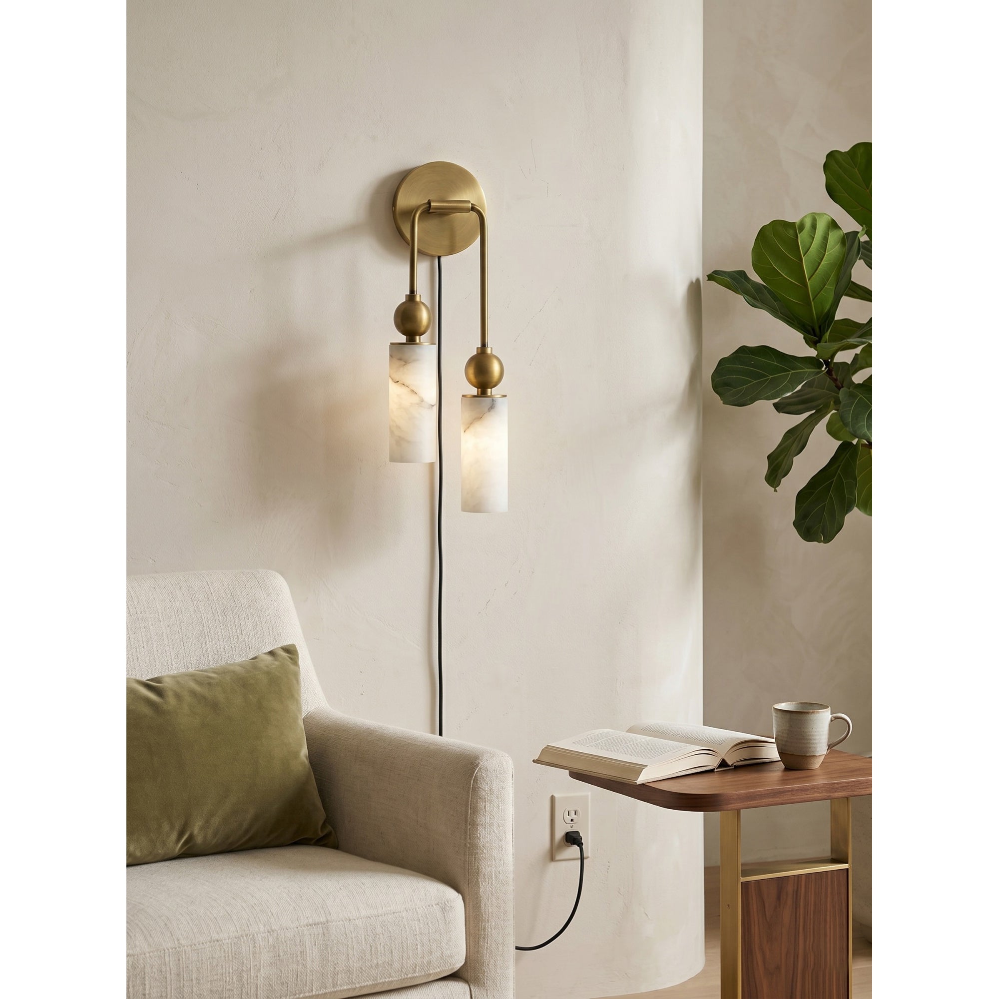 Harlin wall sconce installed in a modern living room setting.