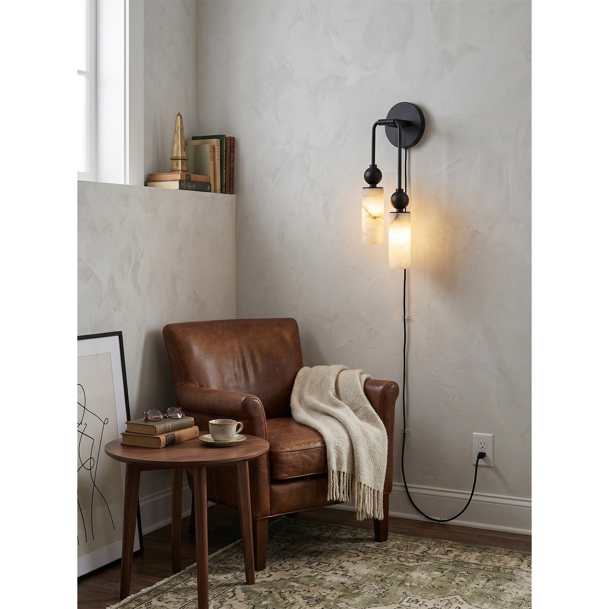 Harlin sconce used as a stylish bedside reading light.
