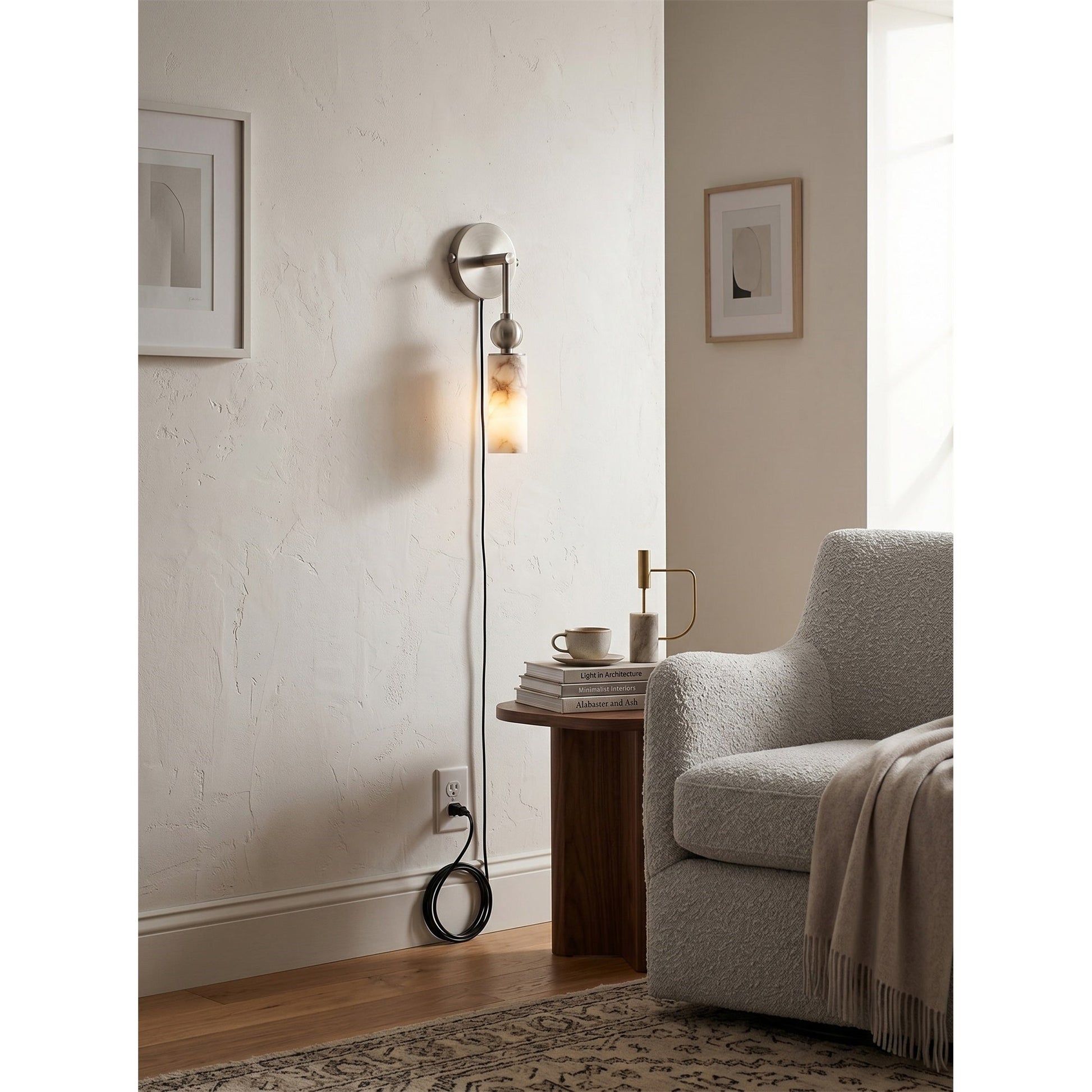 View of the sconce's plug-in cord and in-line switch.