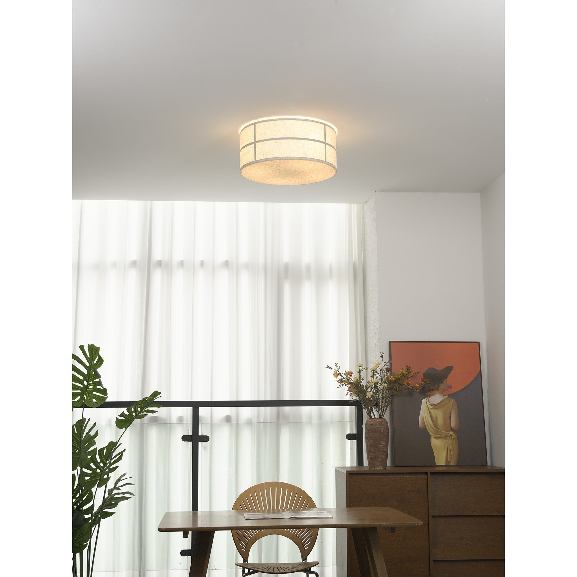 A pair of Hashira Ceiling Lamps installed in a hallway.