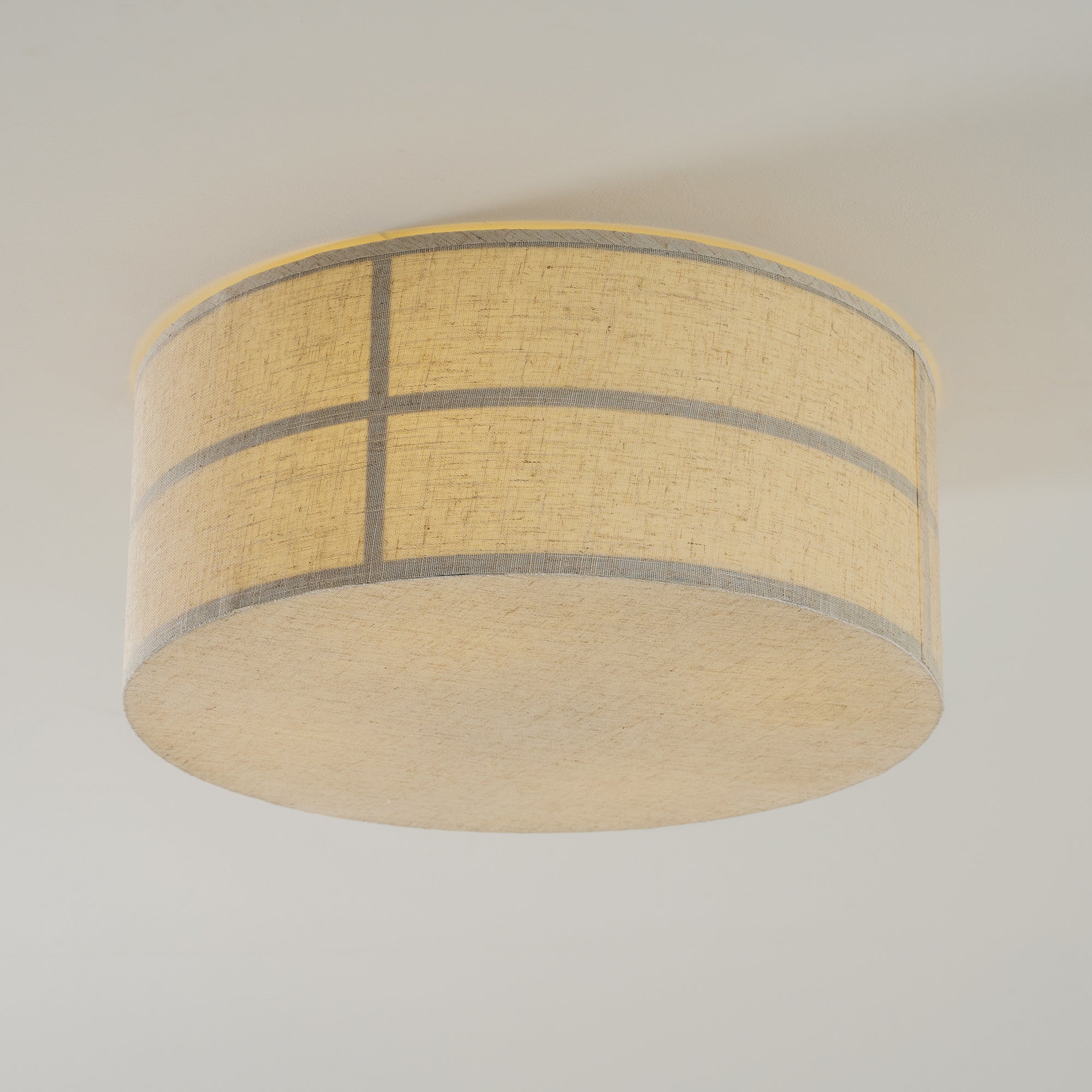 The lamp shown in a commercial setting like a lounge.