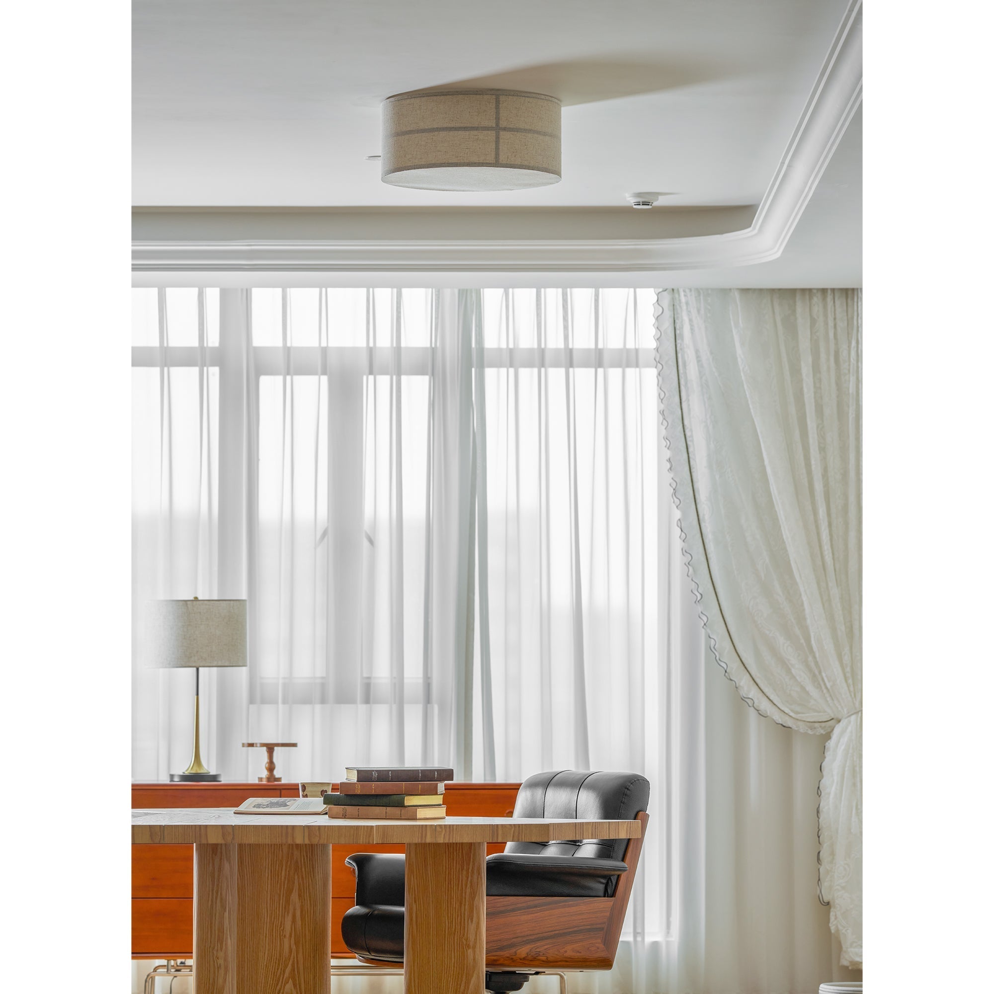 Detail of the light diffusion through the linen shade.