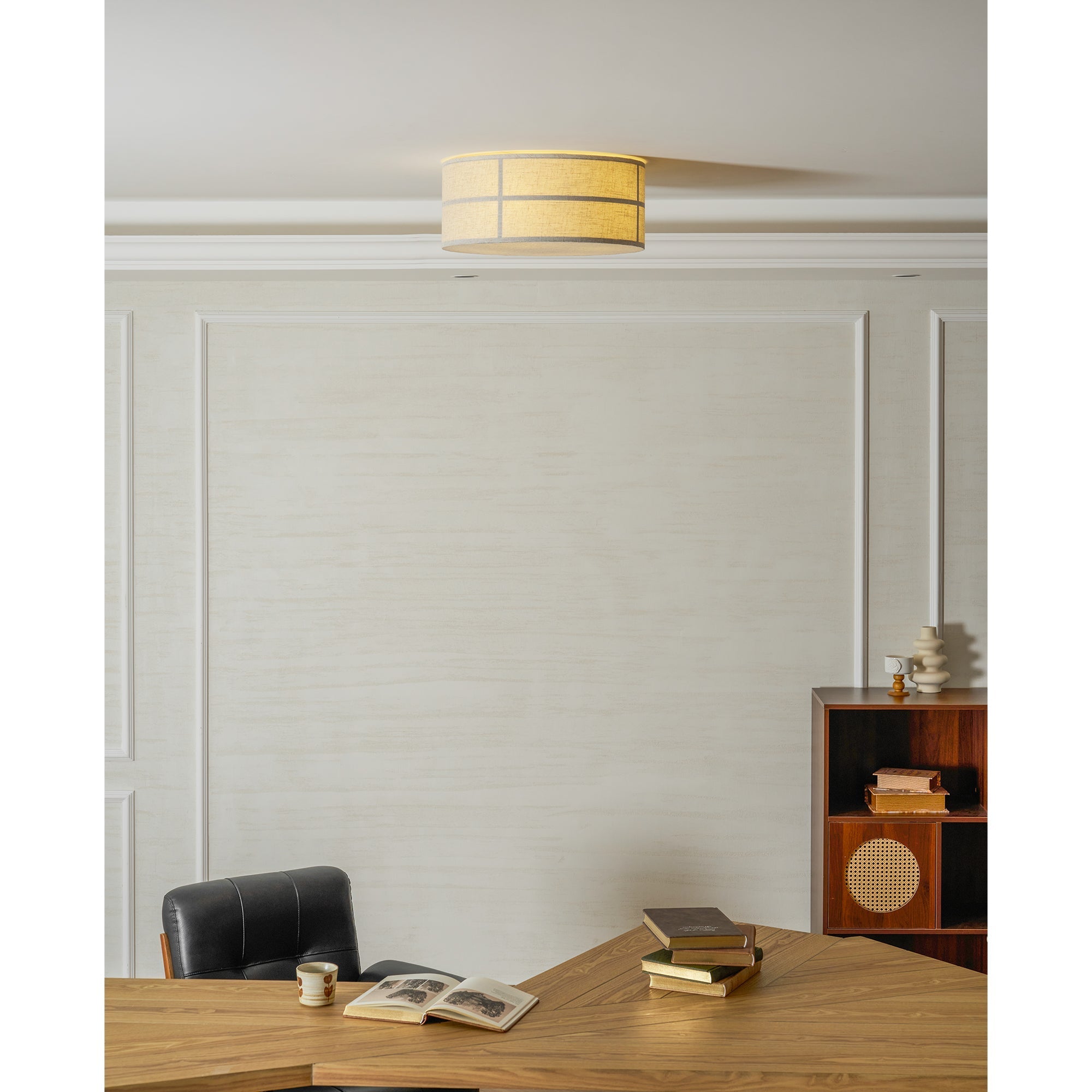 The lamp as a central lighting feature in a study.