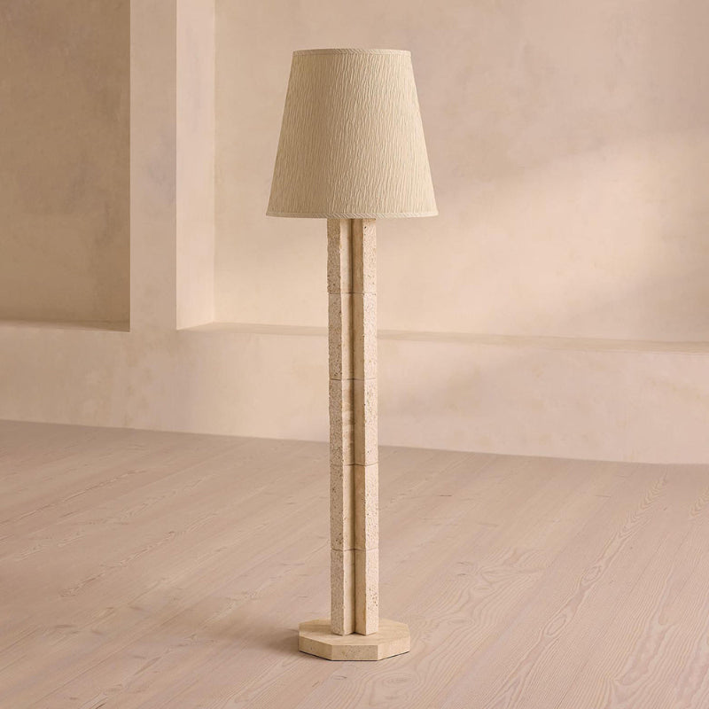The lamp illuminated, casting a warm and inviting glow.