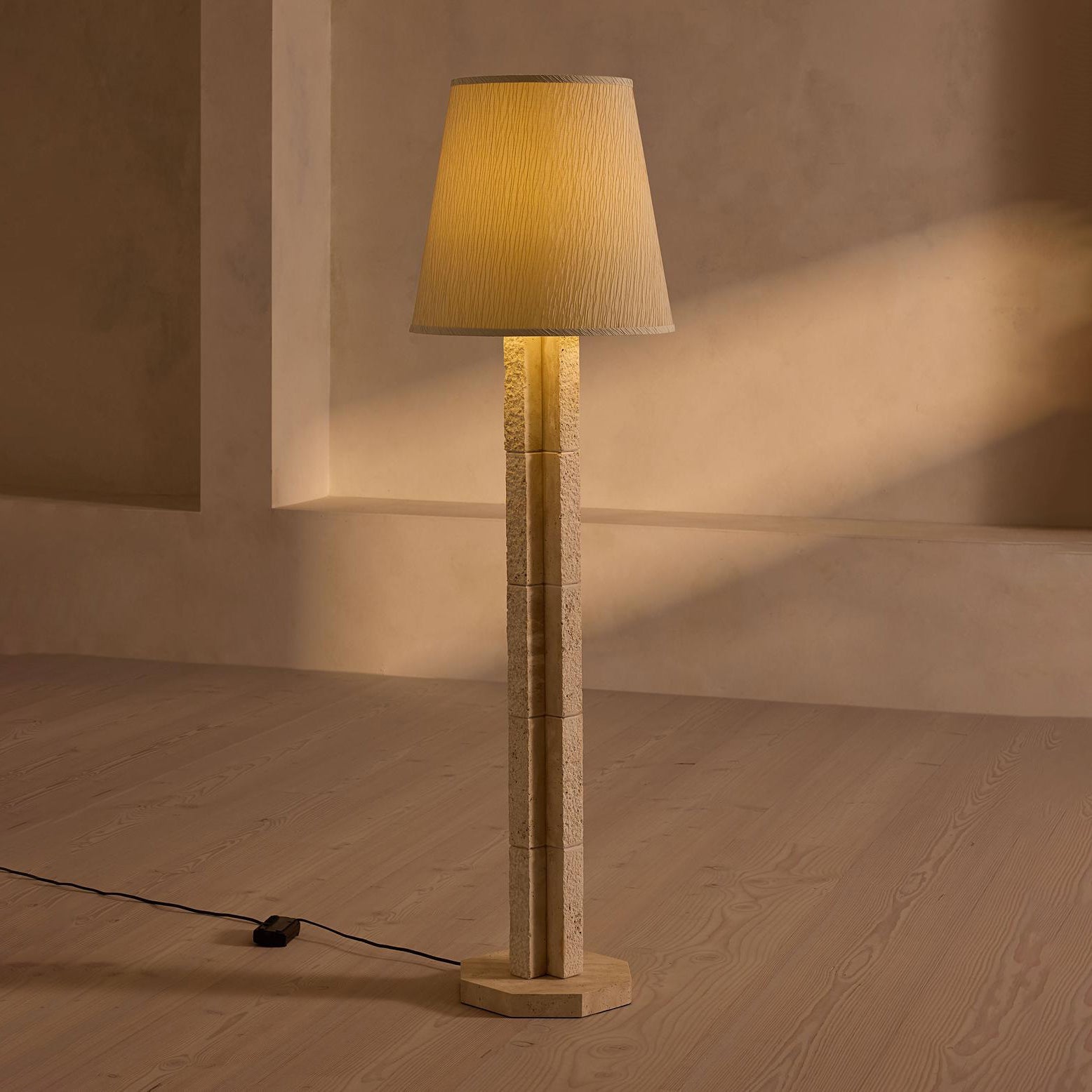 The Hawksworth Floor Lamp viewed from the side, highlighting its sculptural form.