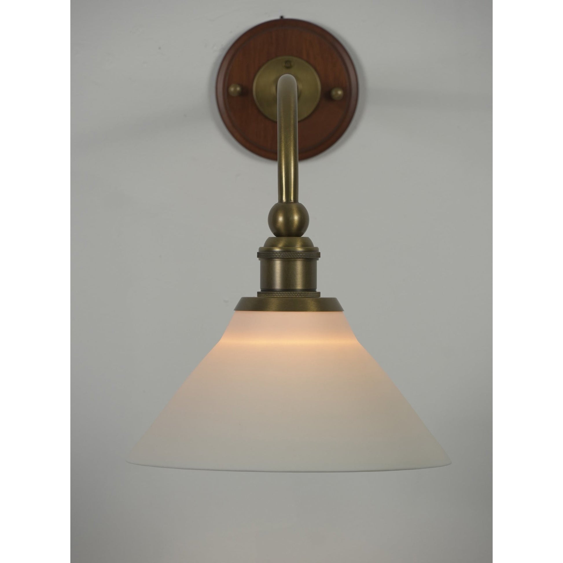 The lamp shown with a vintage-style bulb (not included).
