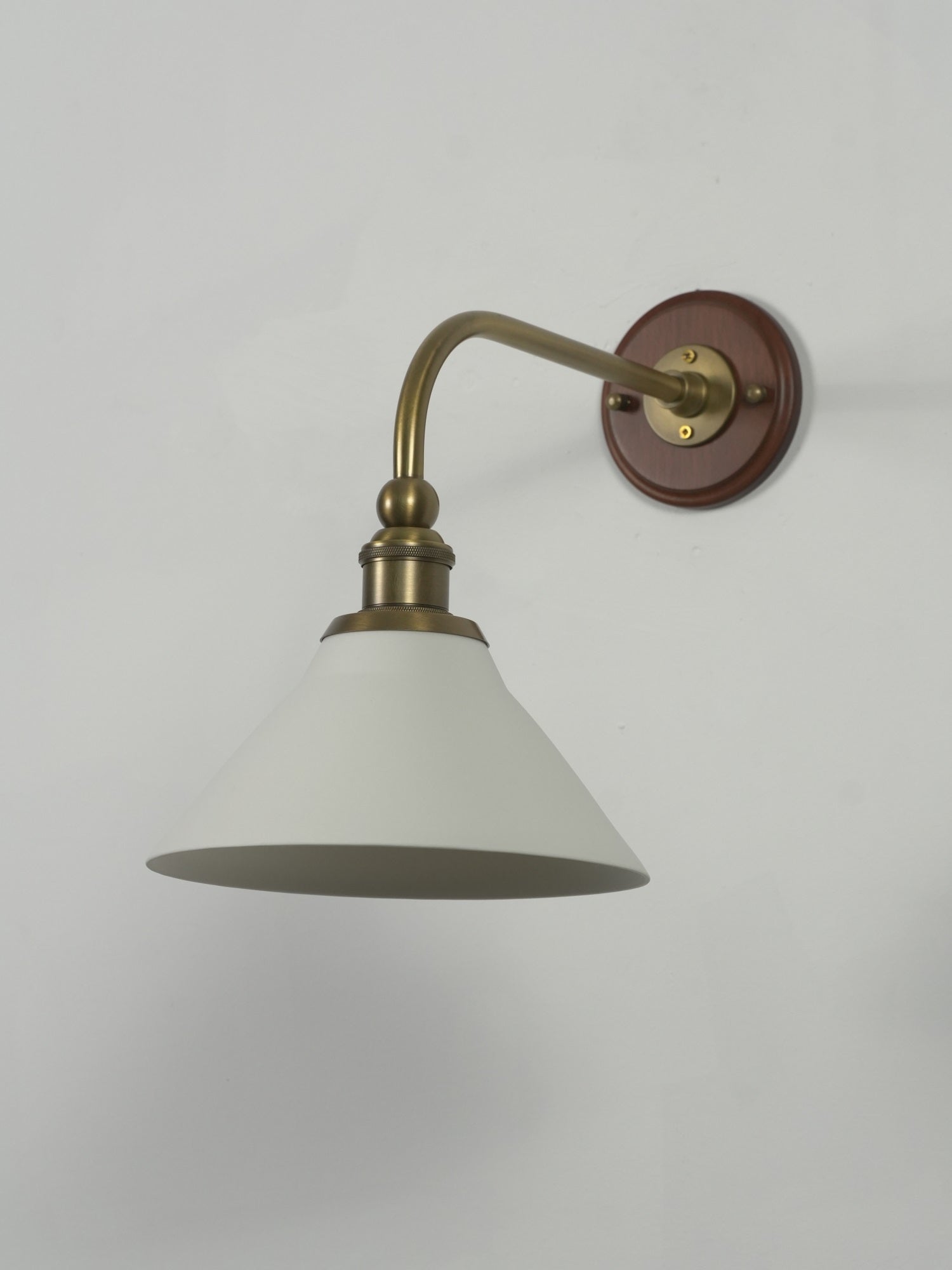 Detail of the polished brass arm.