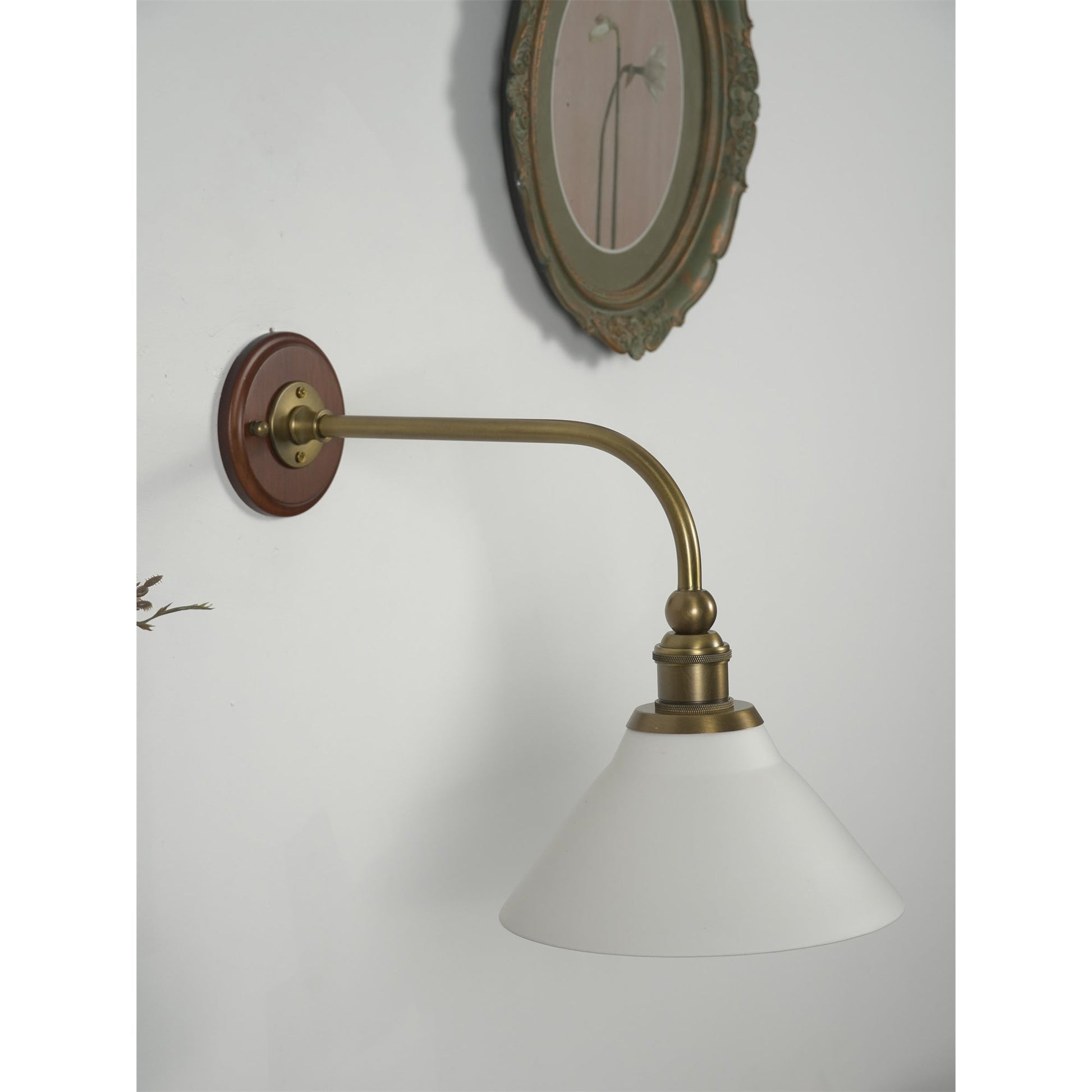 Side profile of the Heirloom wall lamp, highlighting its classic design.