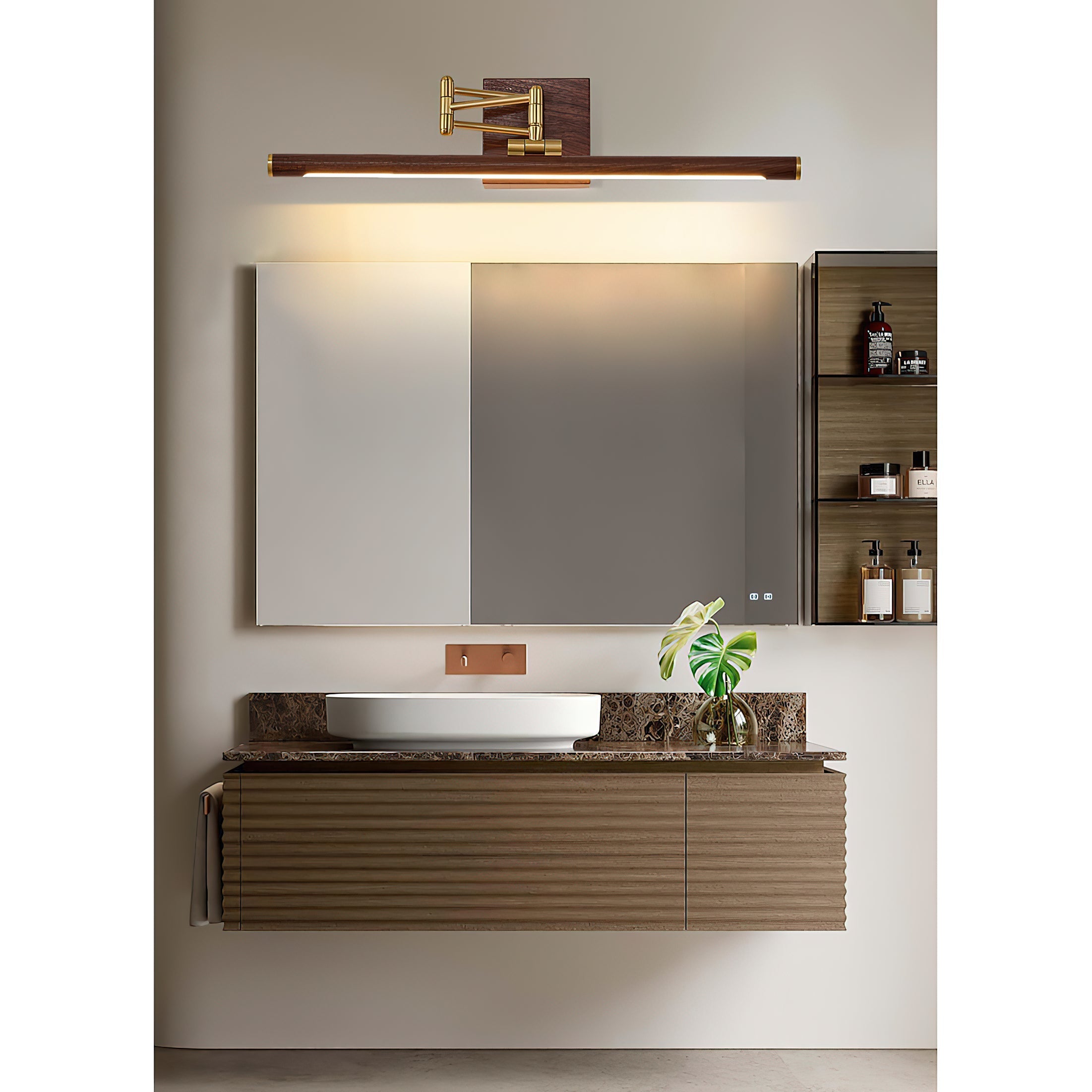 The Stokes wall lamp installed above a bathroom mirror.