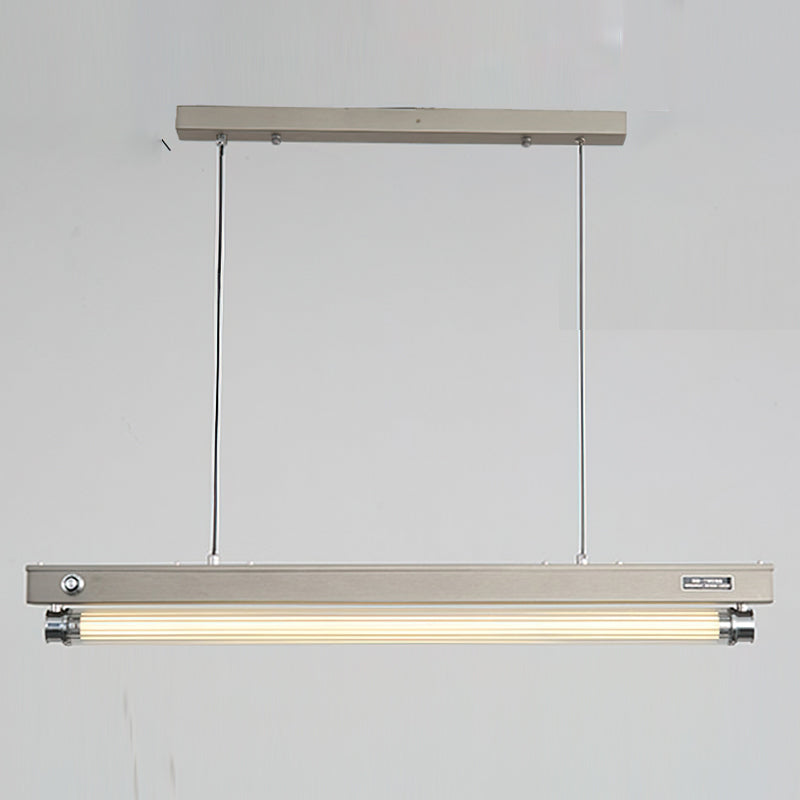 The black Hiromi Chandelier creating a bold contrast against a light-colored wall.