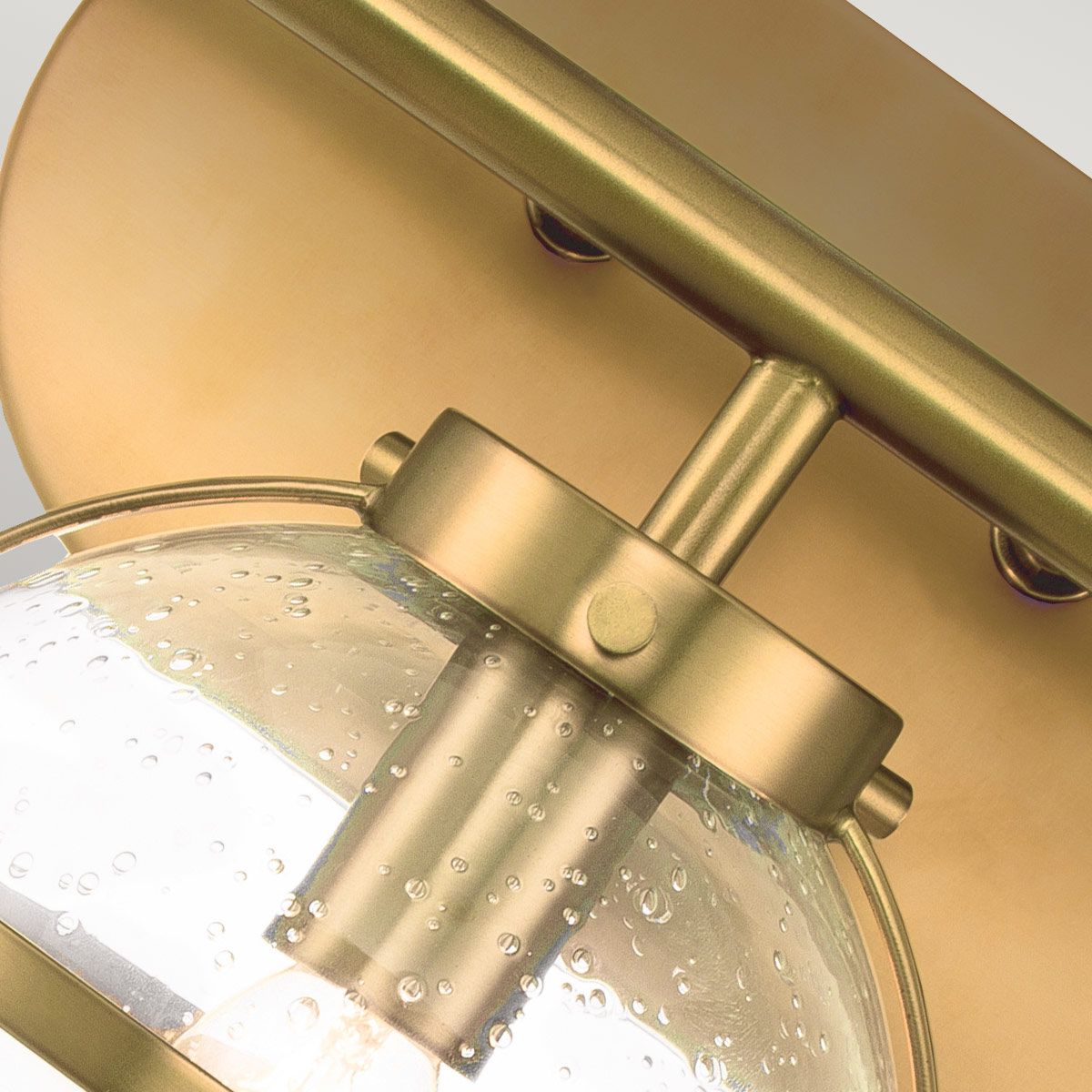 Close-up of the brass finish on the Hollis Wall Lamp.
