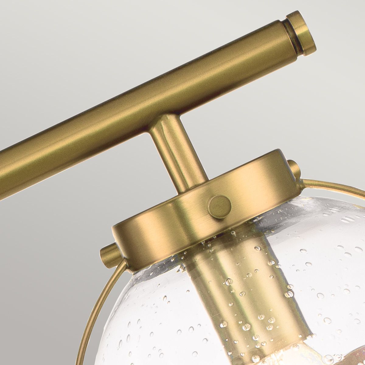 Detail shot of the white glass lampshade on the Hollis Wall Lamp.